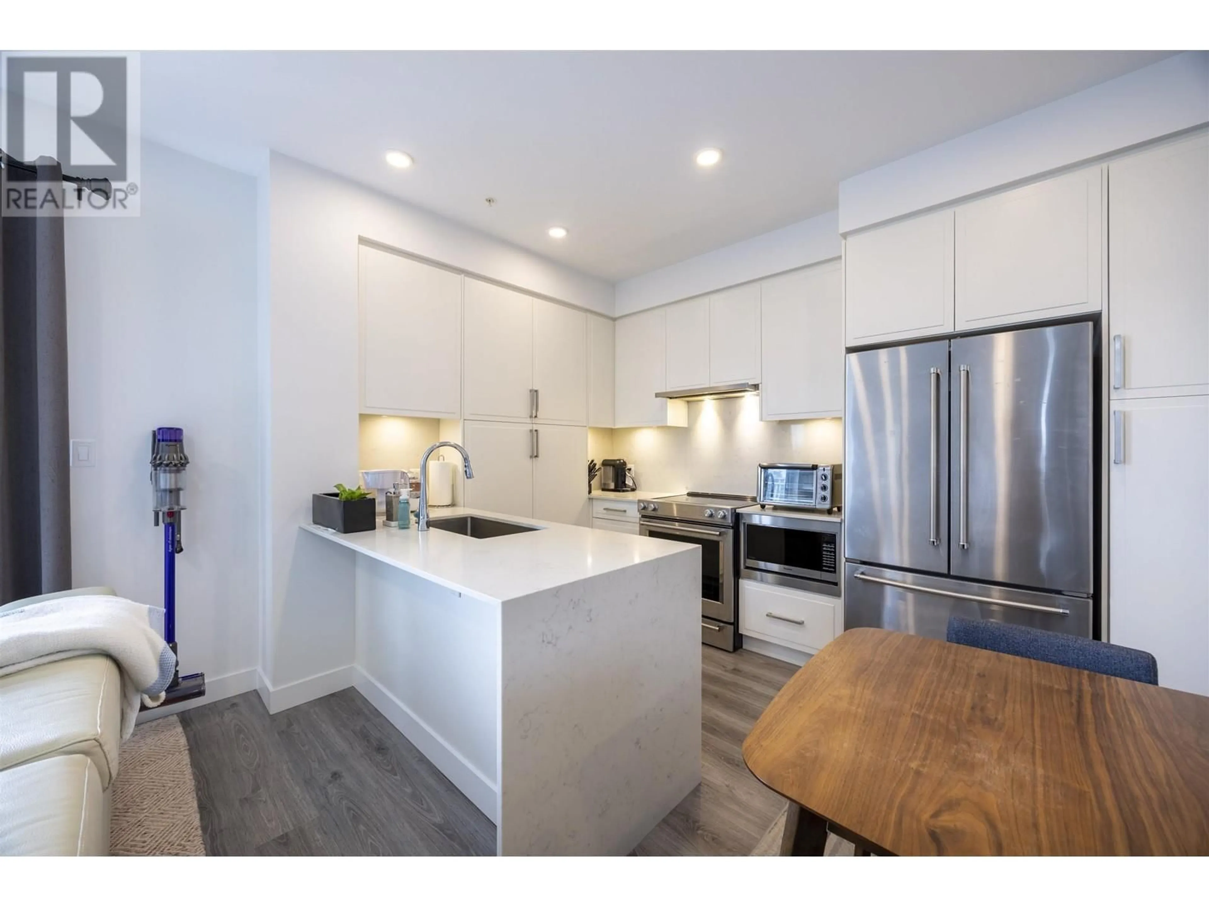 Open concept kitchen, unknown for 606 - 700 CLARKE ROAD, Coquitlam British Columbia V3J0K5