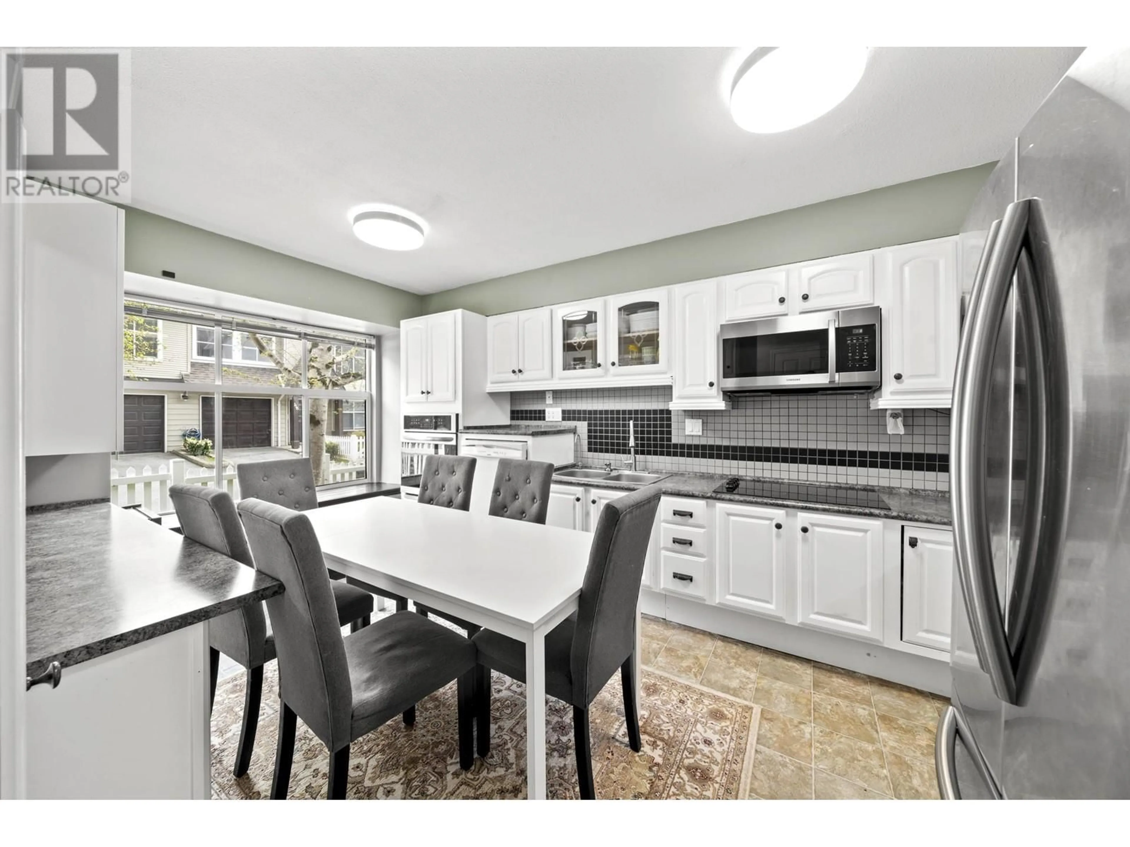 Open concept kitchen, ceramic/tile floor for 113 - 12099 237 STREET, Maple Ridge British Columbia V4R2C3