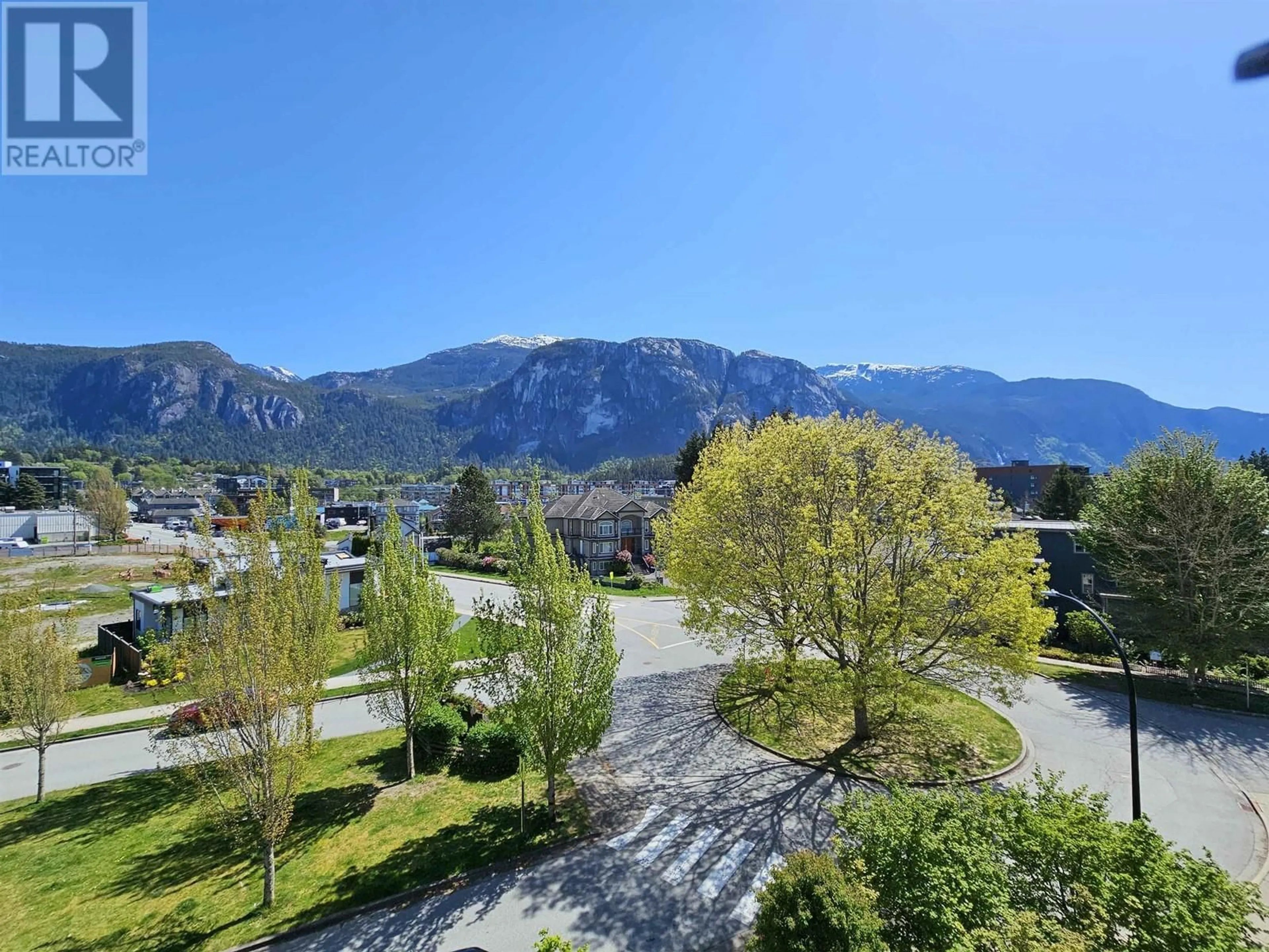 A pic from outside/outdoor area/front of a property/back of a property/a pic from drone, mountain view for 401 - 1203 PEMBERTON AVENUE, Squamish British Columbia V8B0J7