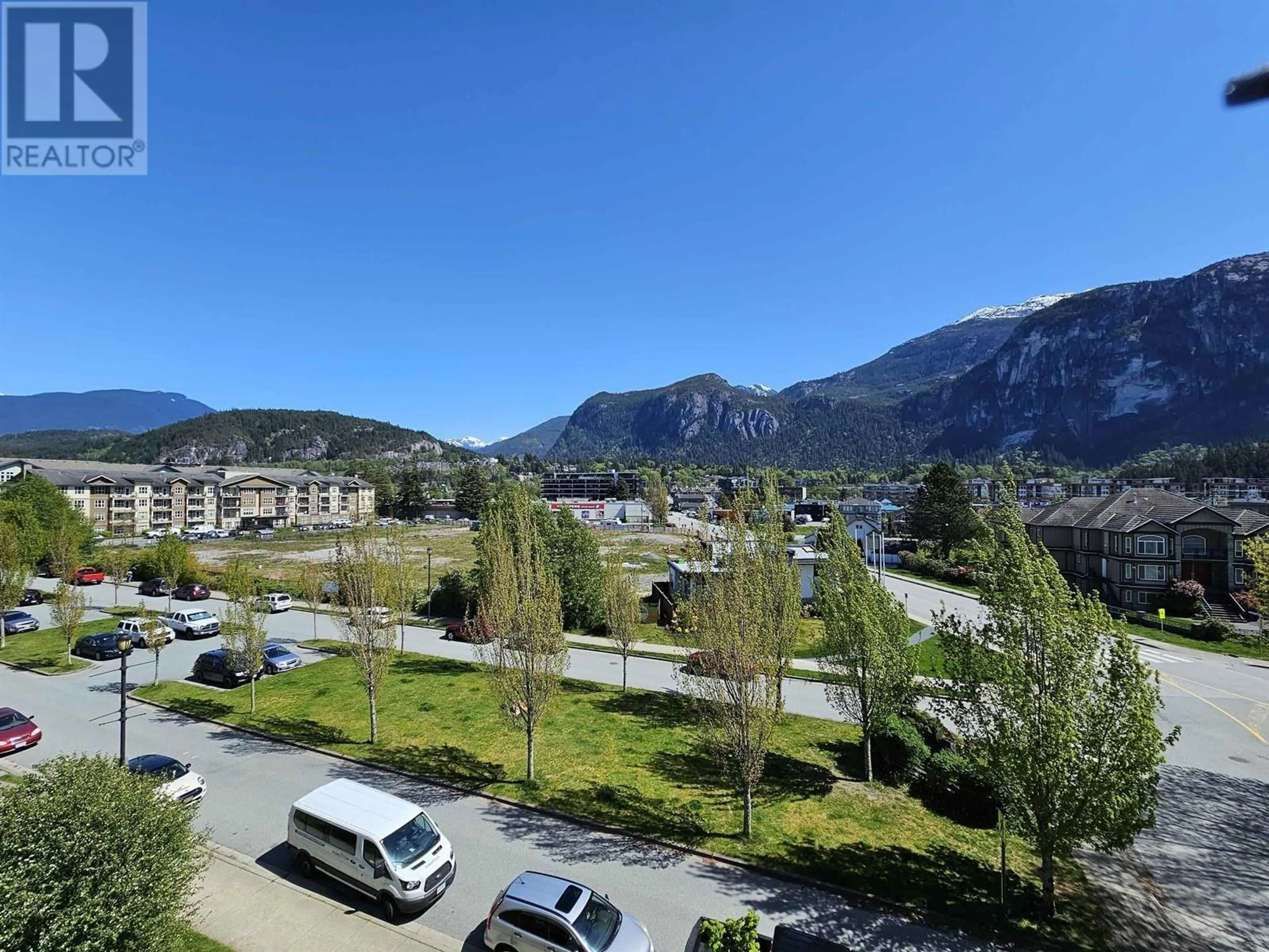 A pic from outside/outdoor area/front of a property/back of a property/a pic from drone, mountain view for 401 - 1203 PEMBERTON AVENUE, Squamish British Columbia V8B0J7