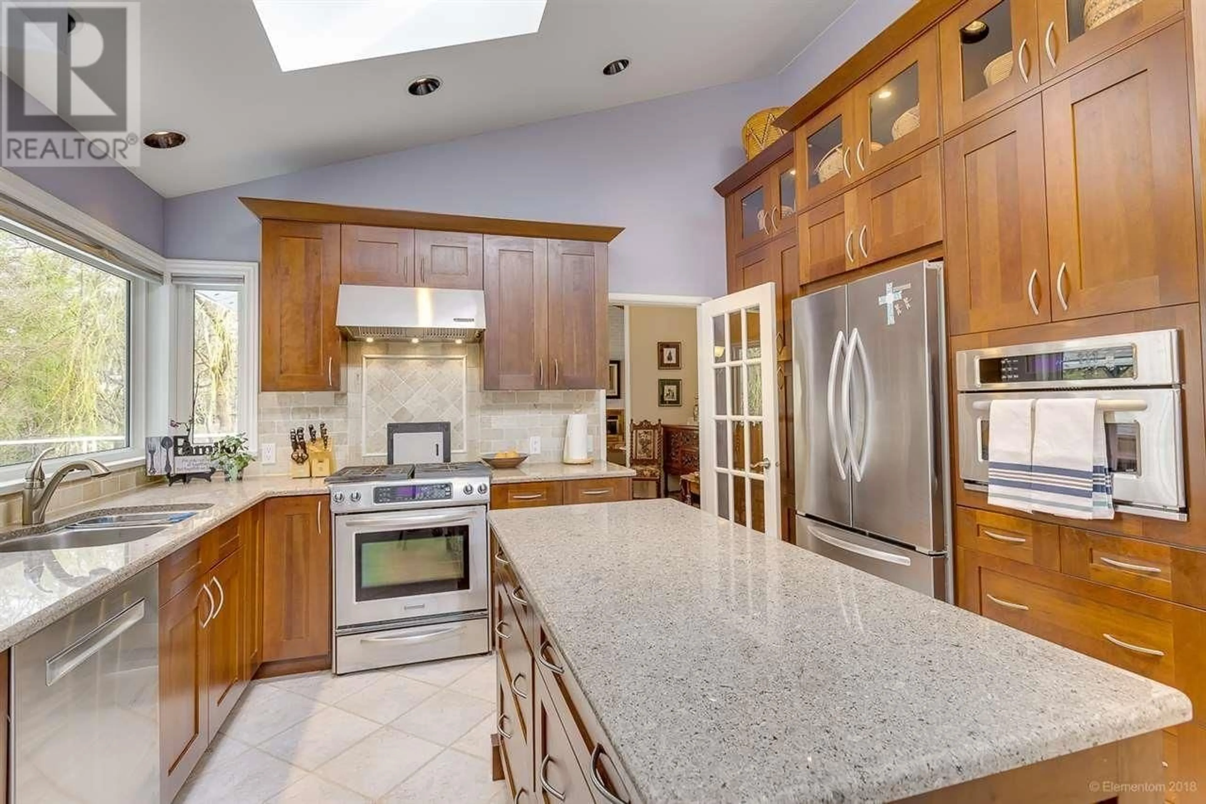 Contemporary kitchen, ceramic/tile floor for 7789 KENTWOOD STREET, Burnaby British Columbia V5A2E6