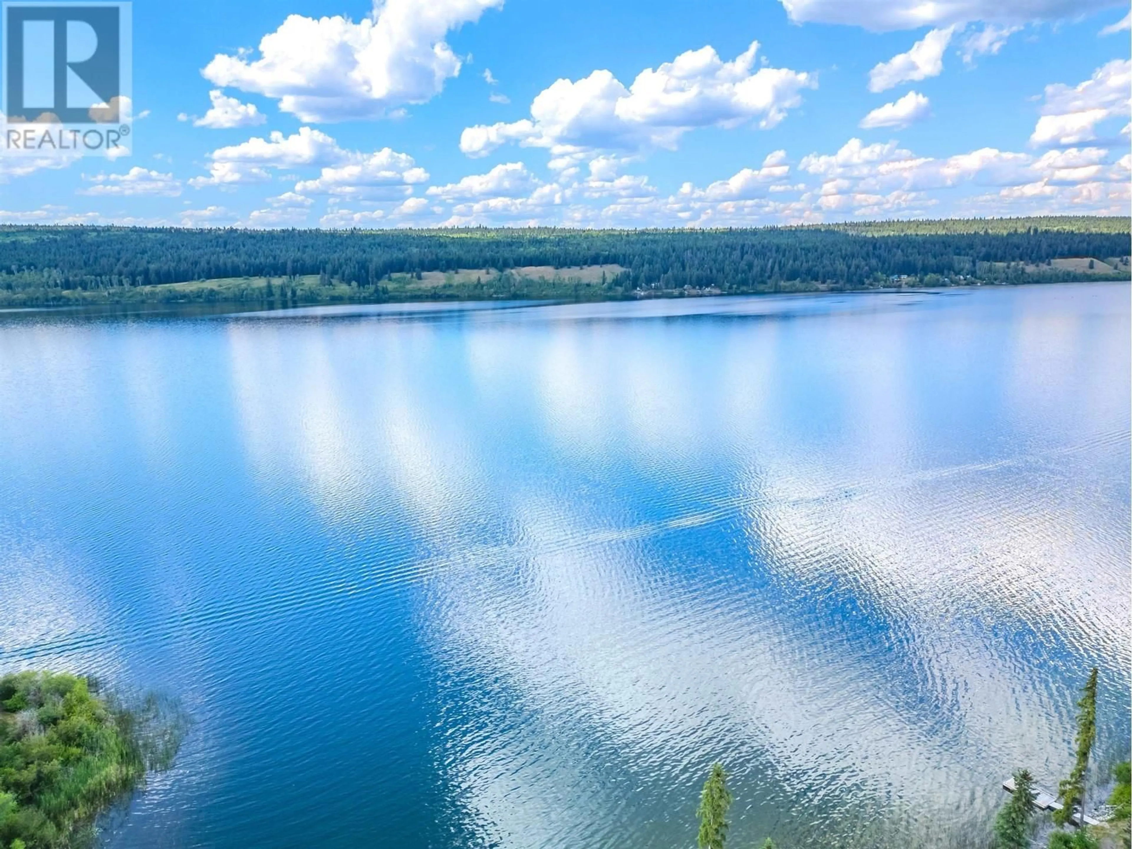 A pic from outside/outdoor area/front of a property/back of a property/a pic from drone, water/lake/river/ocean view for 6513 MONETTE ROAD, 100 Mile House British Columbia V0K1K0
