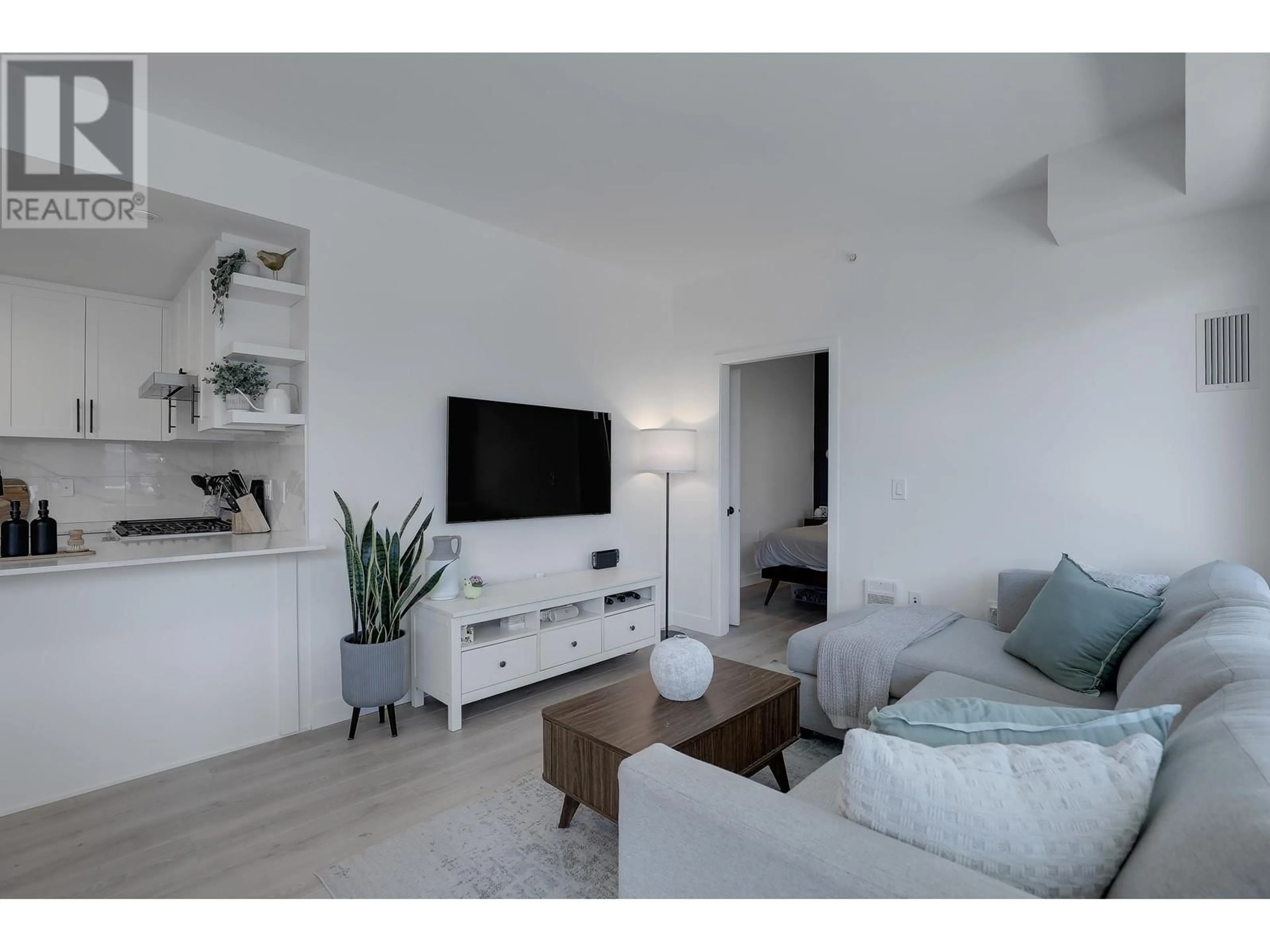 Living room with furniture, unknown for 401 - 2688 DUKE STREET, Vancouver British Columbia V5R4S9