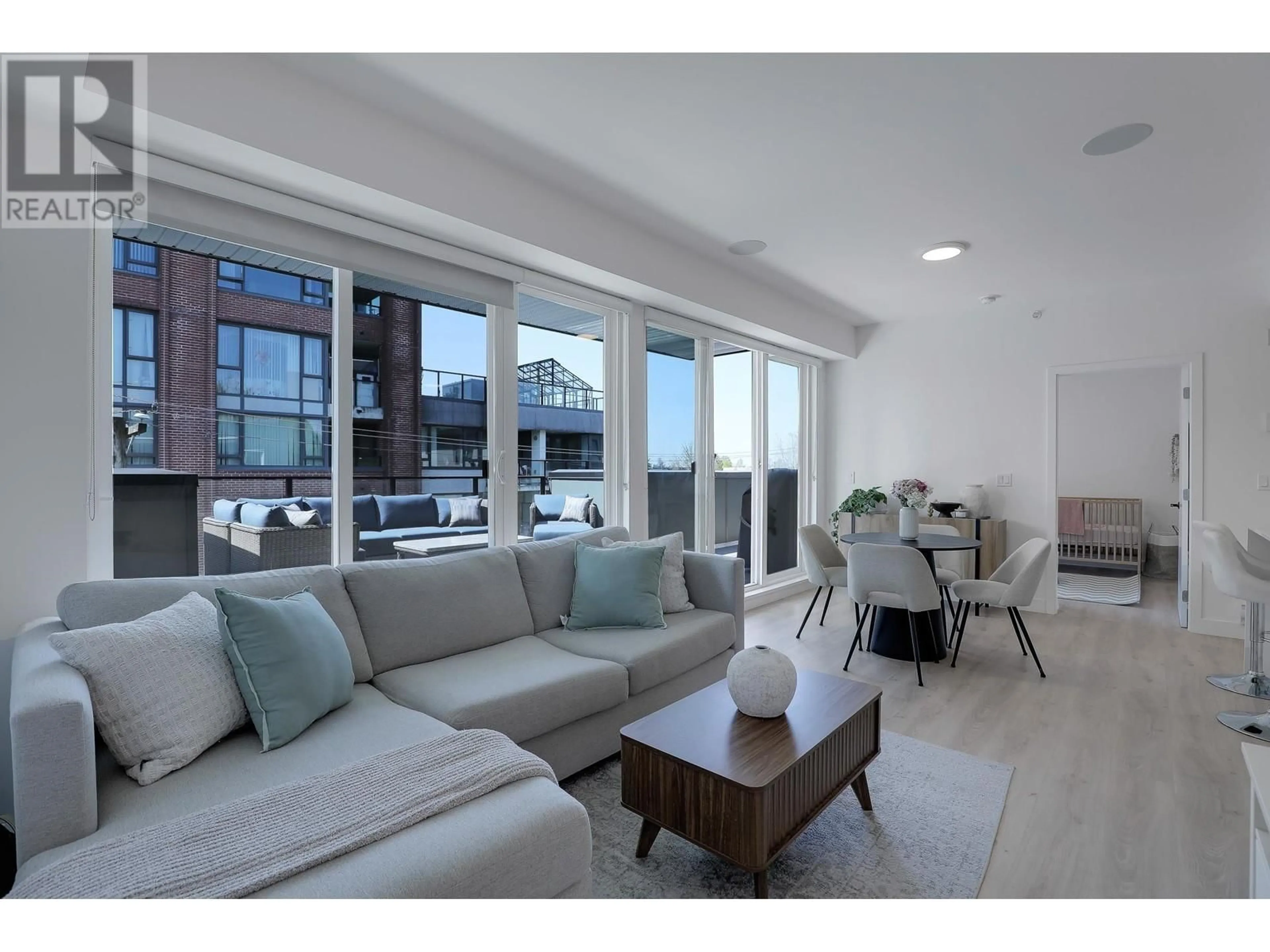 Living room with furniture, unknown for 401 - 2688 DUKE STREET, Vancouver British Columbia V5R4S9