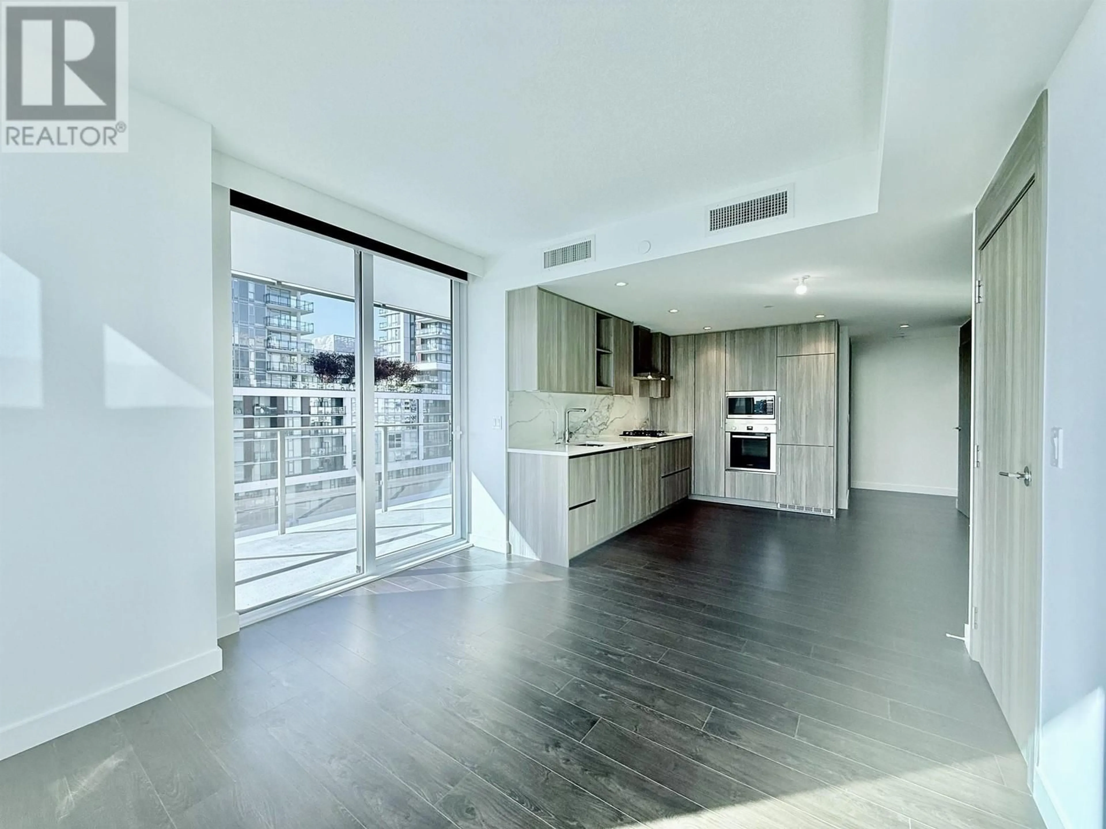 Open concept kitchen, unknown for 710 - 8611 HAZELBRIDGE WAY, Richmond British Columbia V6X0W8