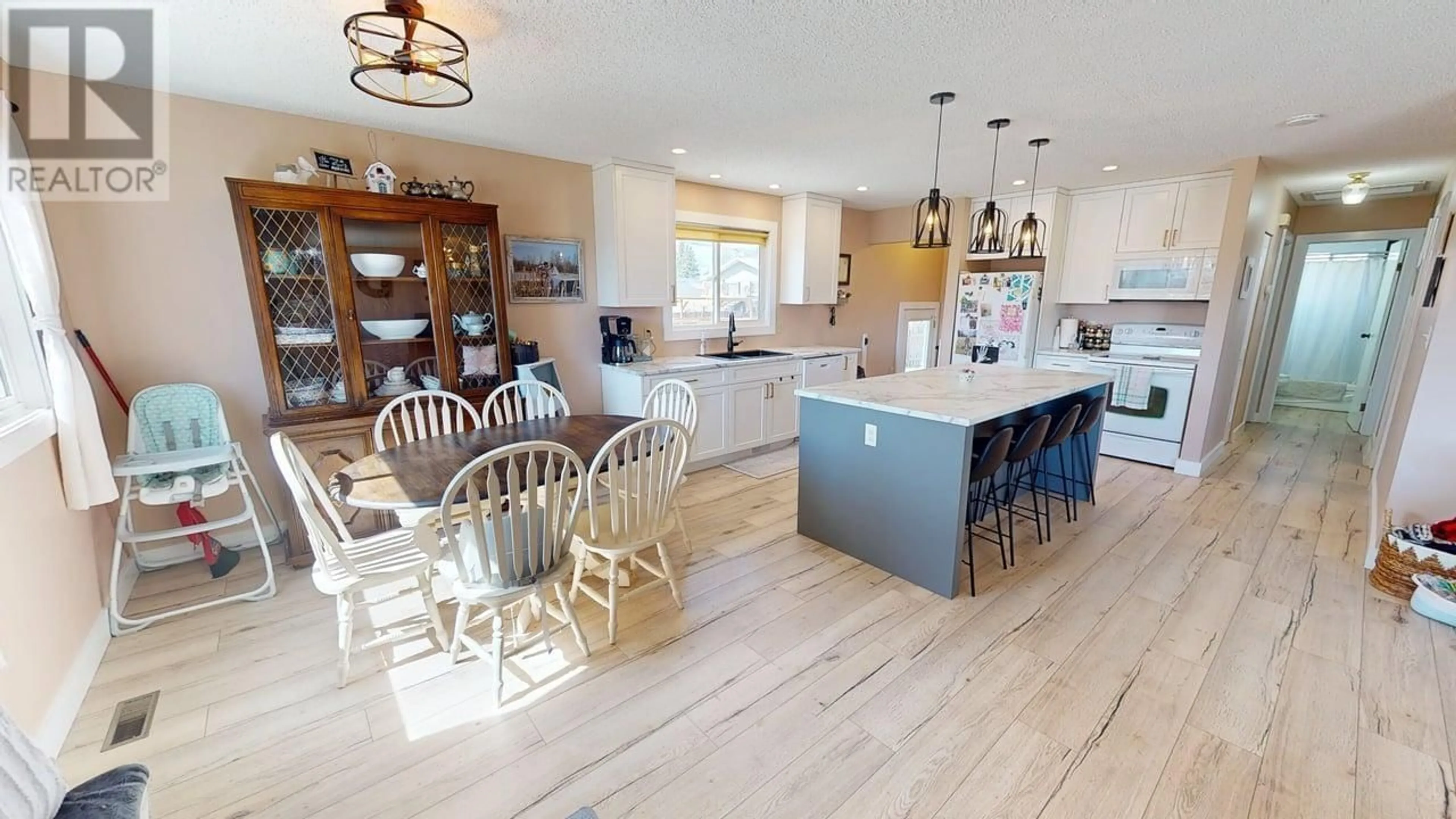 Open concept kitchen, ceramic/tile floor for 8212 96 AVENUE, Fort St. John British Columbia V1J1J8