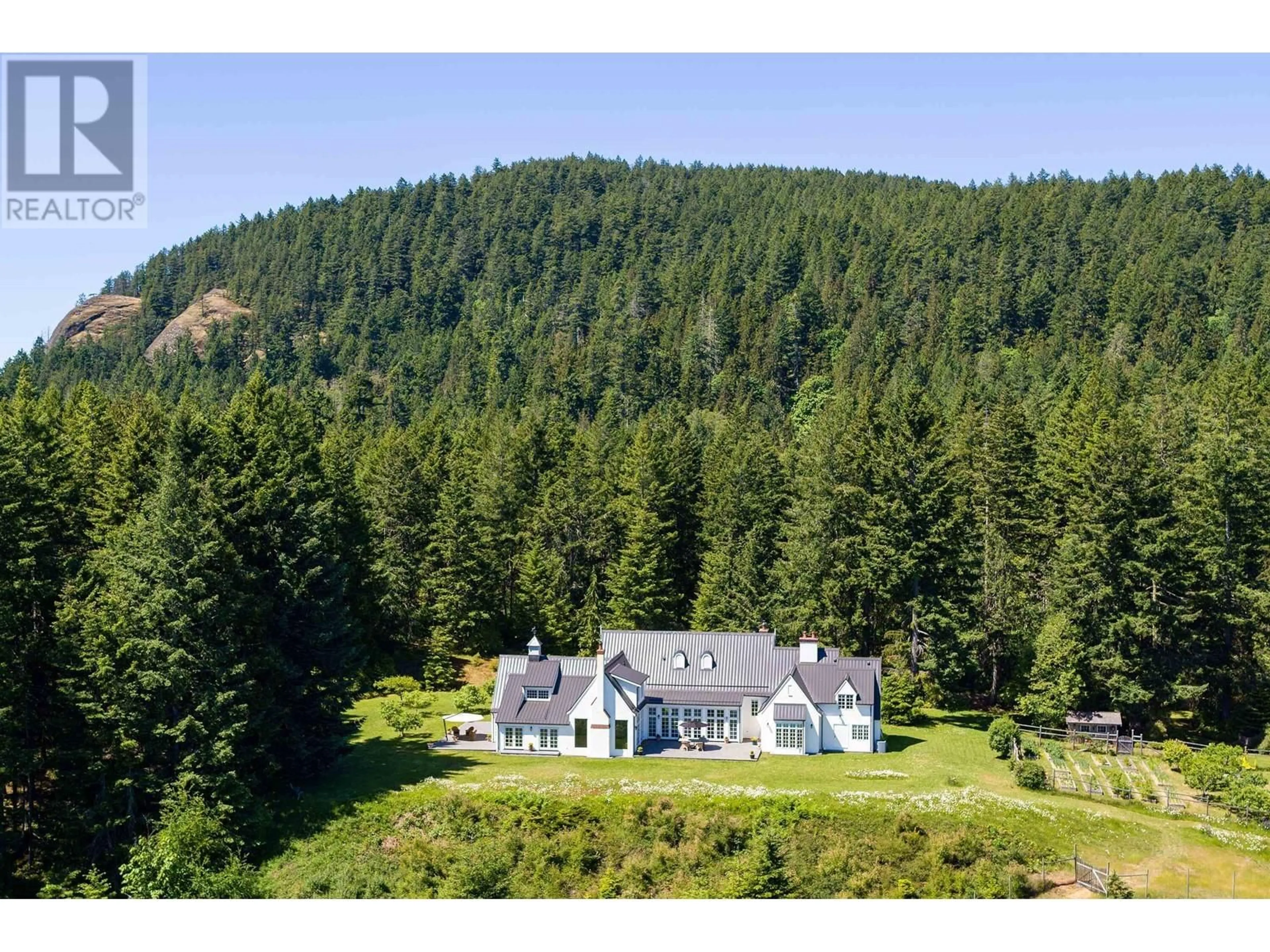 A pic from outside/outdoor area/front of a property/back of a property/a pic from drone, mountain view for 377 SEYMOUR HEIGHTS, Salt Spring Island British Columbia V8K2B6