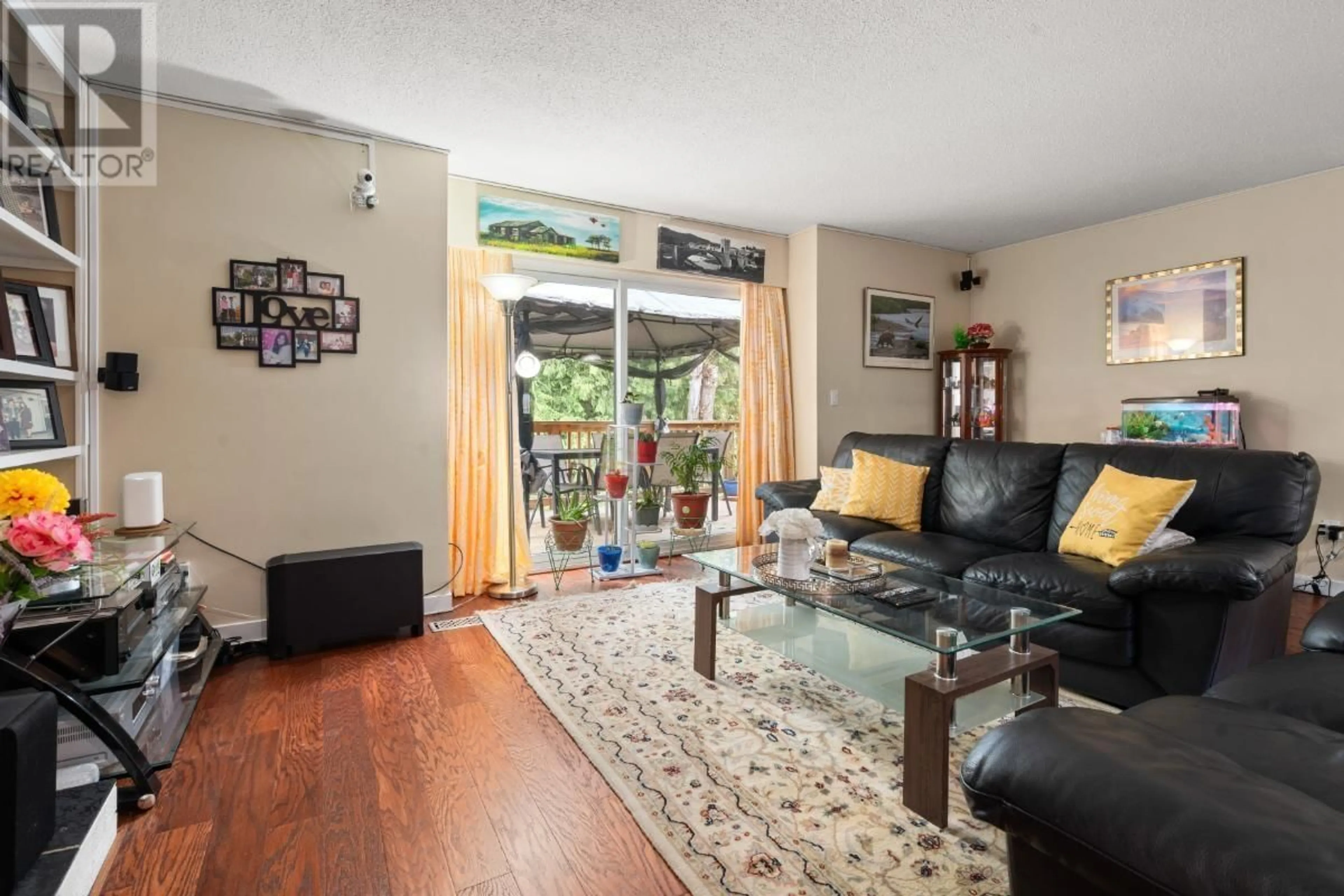 Living room with furniture, wood/laminate floor for 883 OLD LILLOOET ROAD, North Vancouver British Columbia V7J2H6
