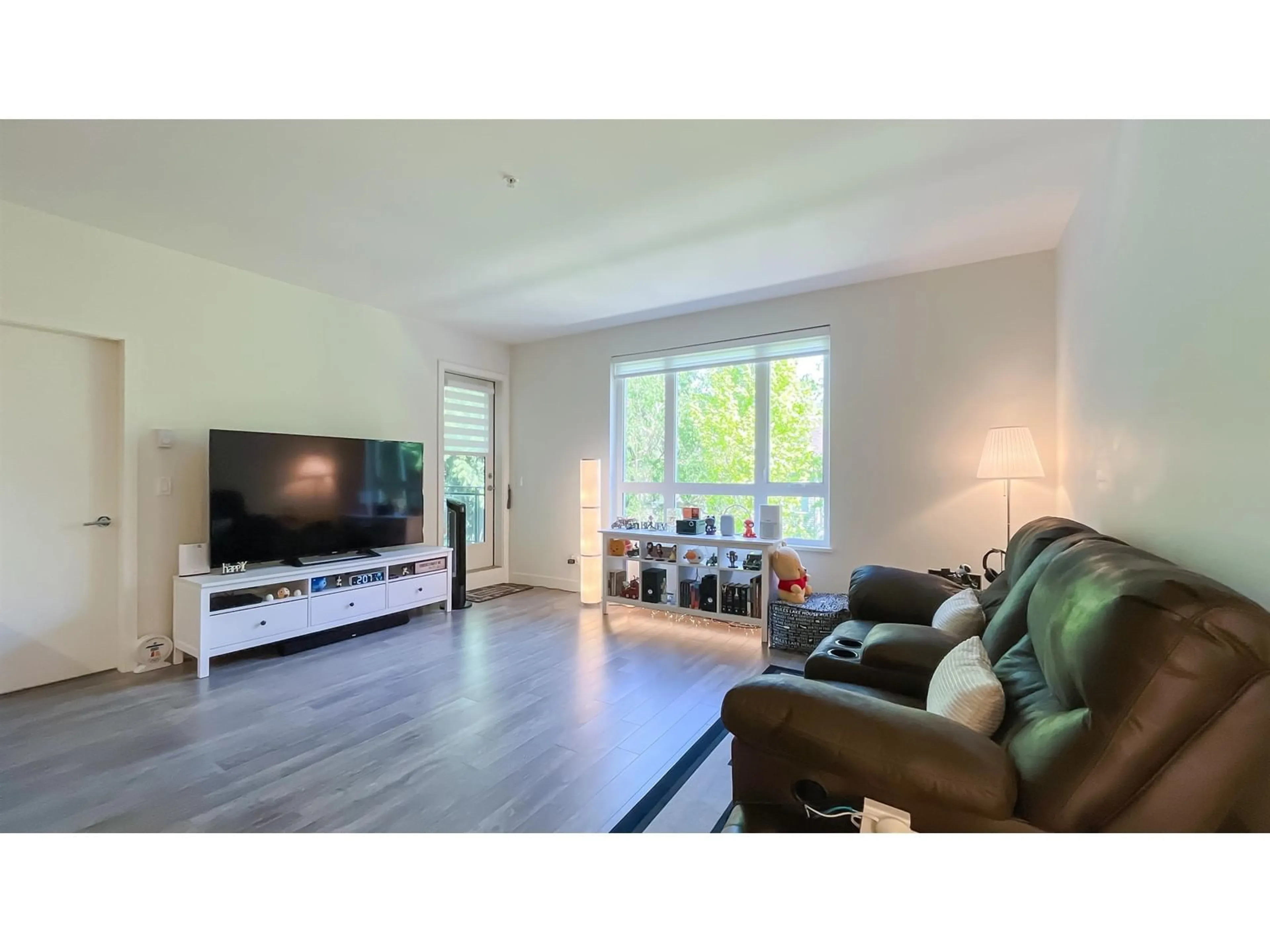 Living room with furniture, unknown for 212 - 13919 FRASER, Surrey British Columbia V3T4E6