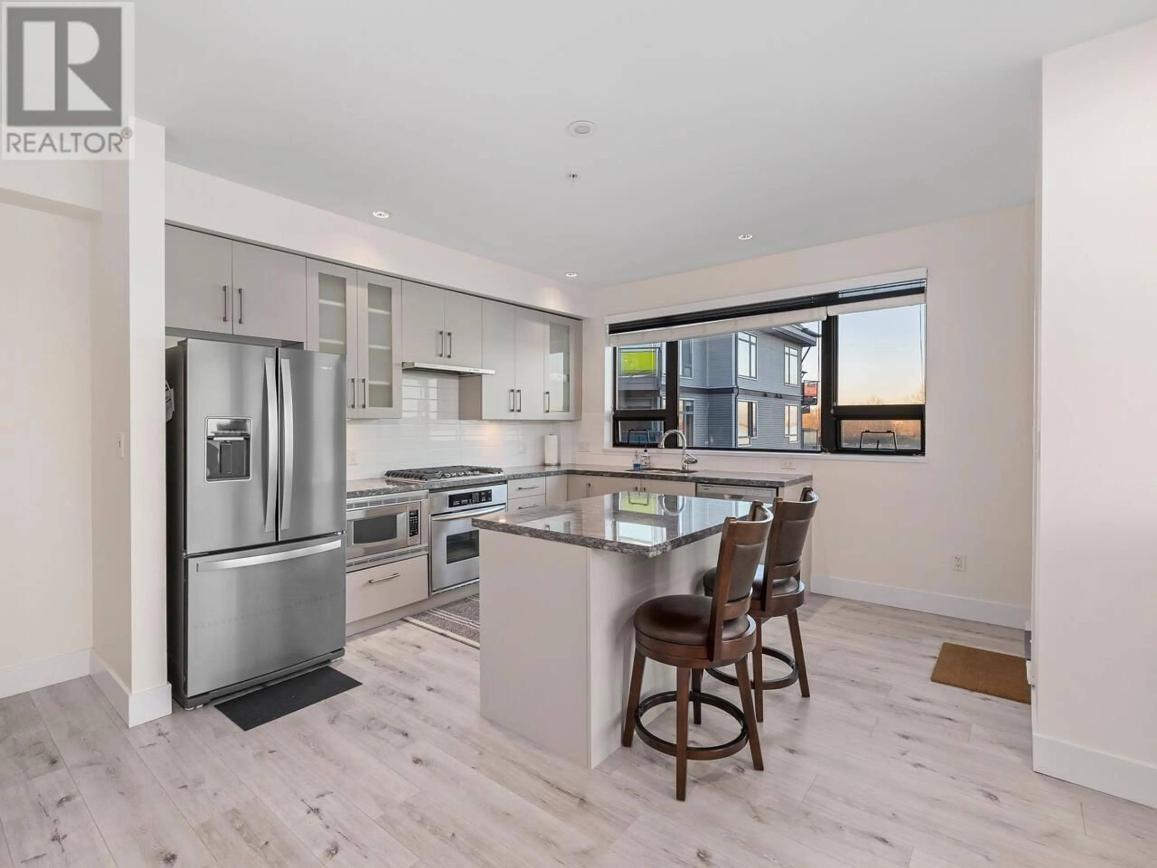 Open concept kitchen, unknown for 310 - 14200 RIVERPORT WAY, Richmond British Columbia V6W1M4