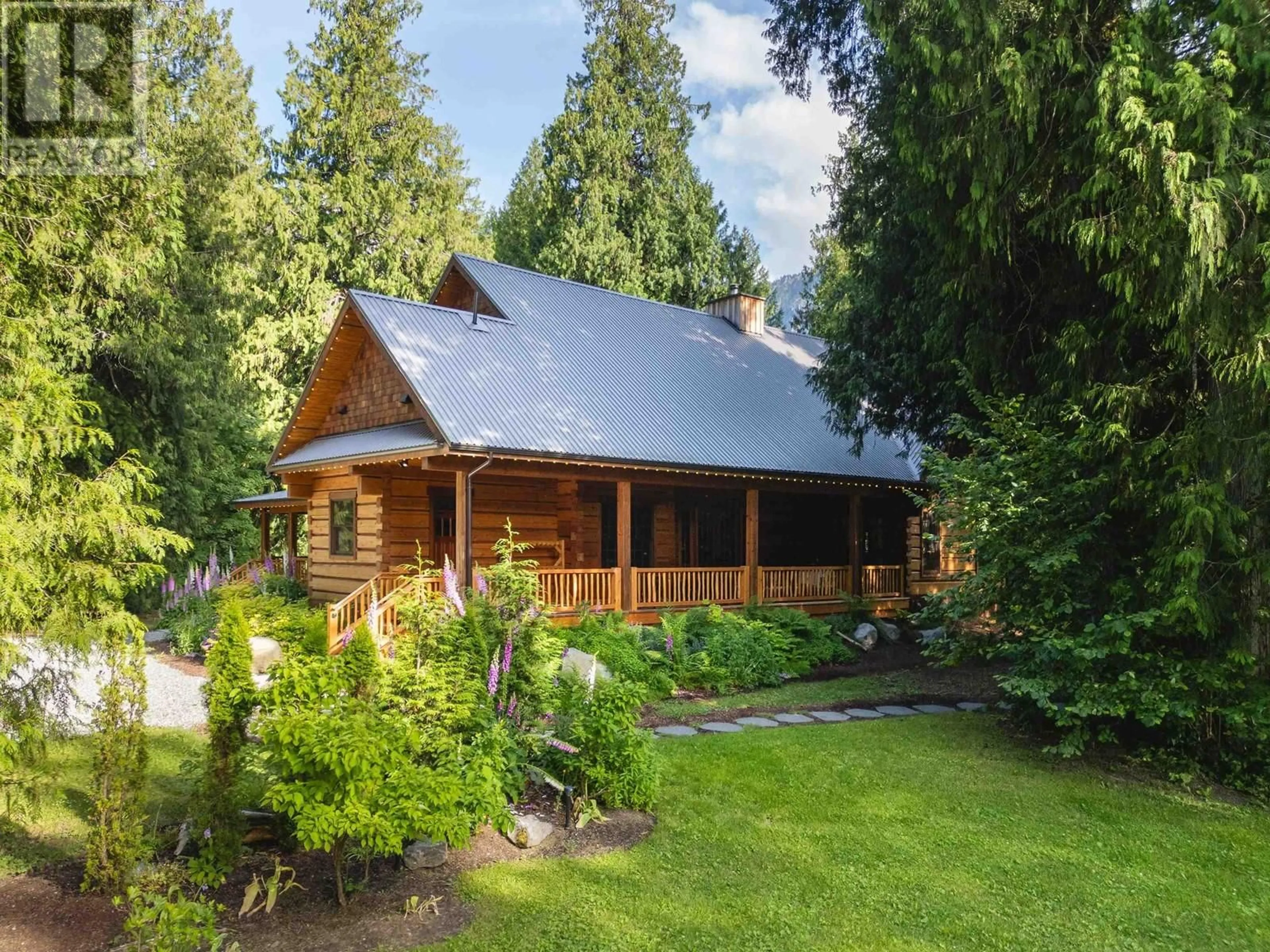 A pic from outside/outdoor area/front of a property/back of a property/a pic from drone, mountain view for 1710 HIGHWAY 99, Pemberton British Columbia V0N2L0