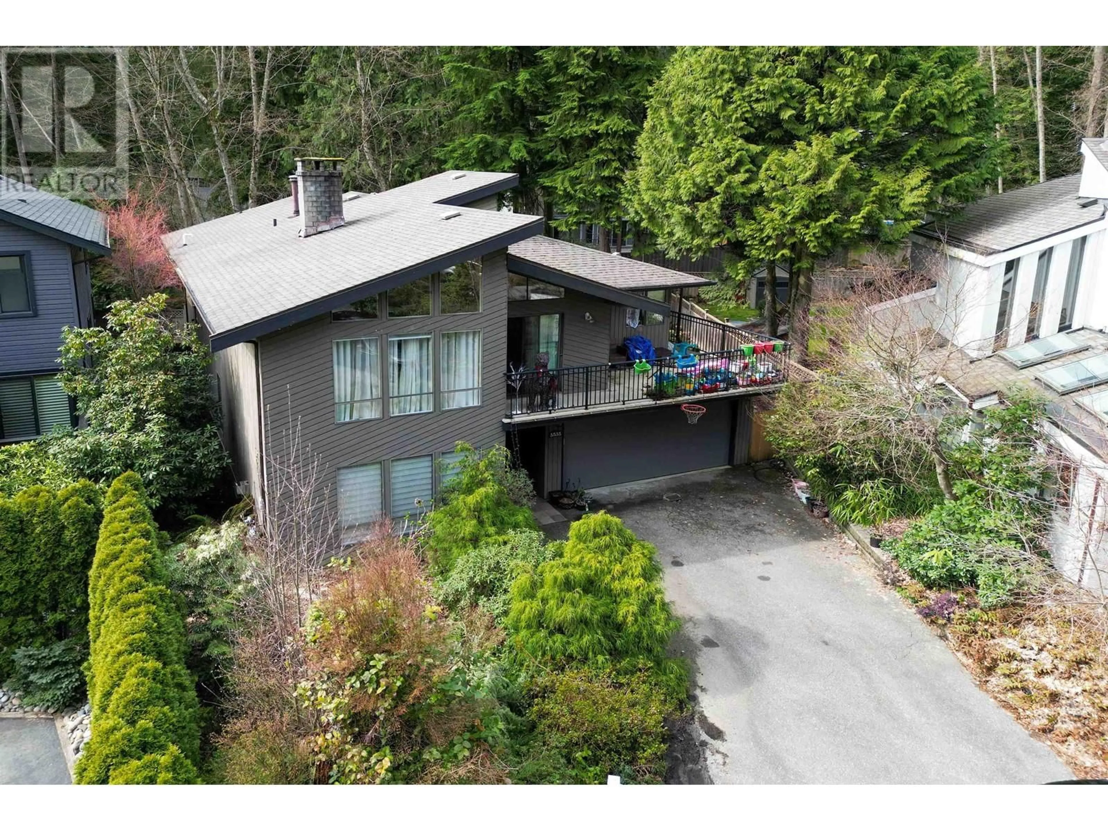 A pic from outside/outdoor area/front of a property/back of a property/a pic from drone, street for 5535 HUCKLEBERRY LANE, North Vancouver British Columbia V7R4N9