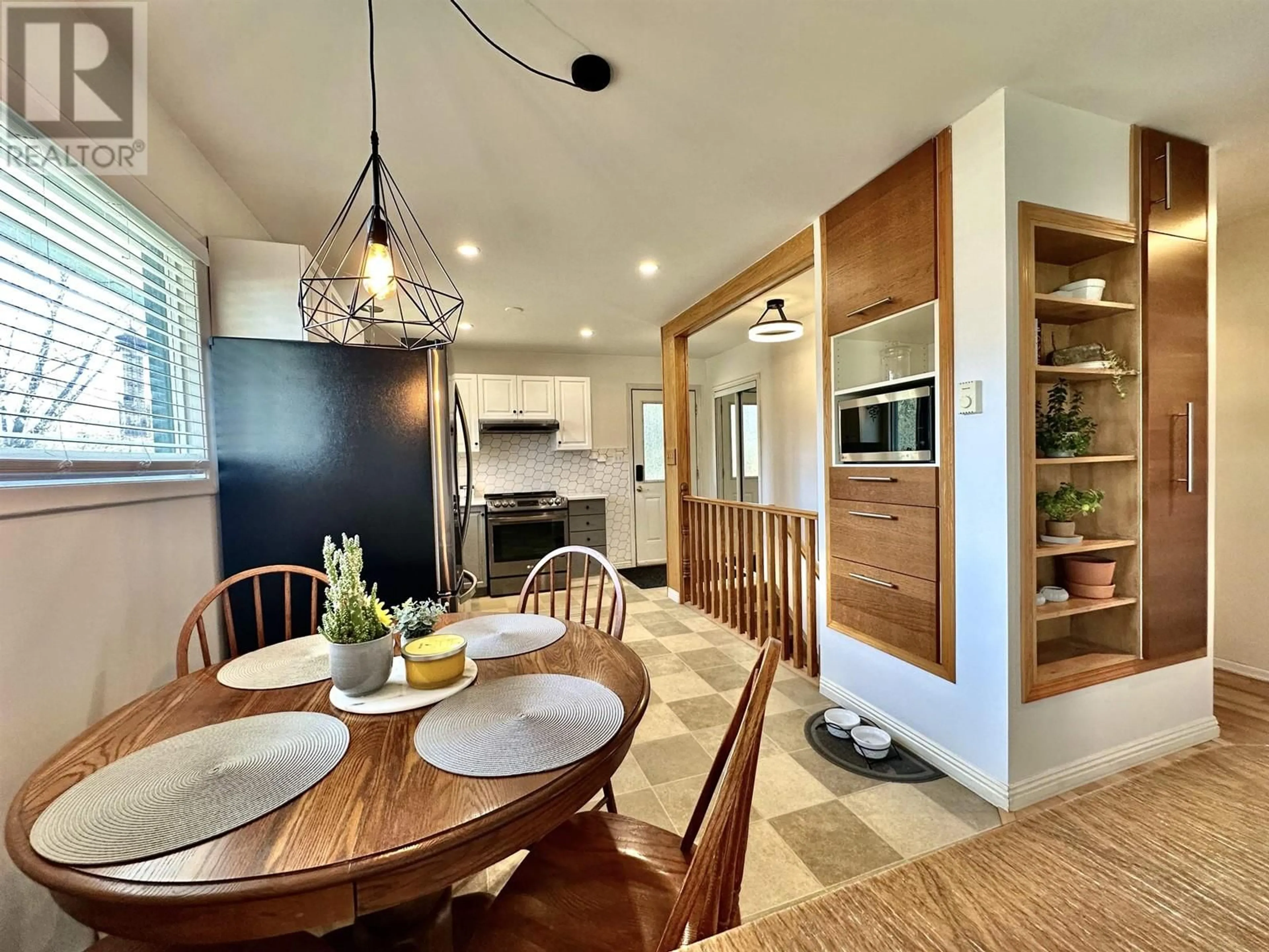 Open concept kitchen, wood/laminate floor for 1260 3RD AVENUE, Valemount British Columbia V0E2Z0