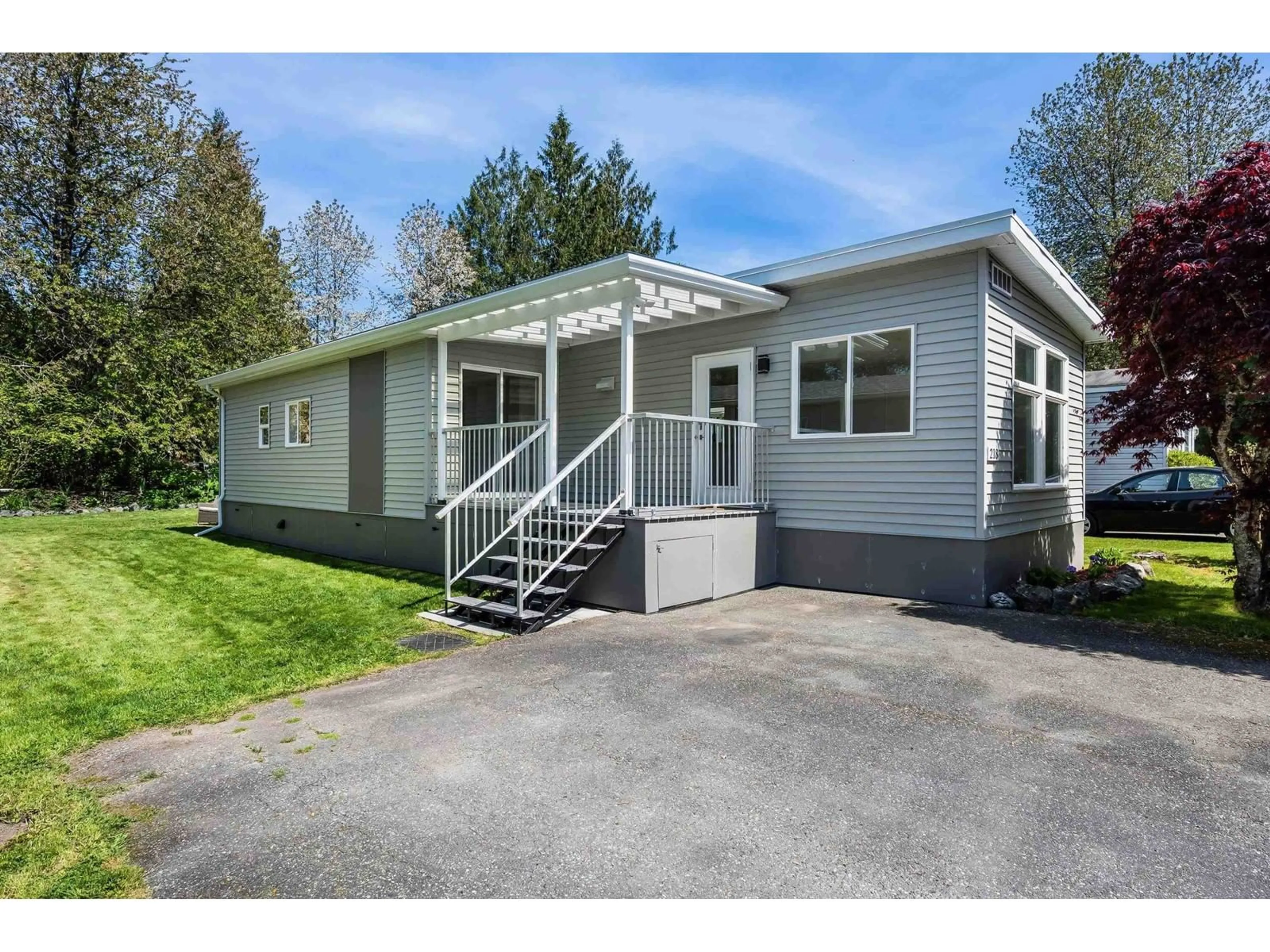 Home with vinyl exterior material, street for 218 - 45835 SLEEPY HOLLOW ROAD, Cultus Lake British Columbia V2R5A9