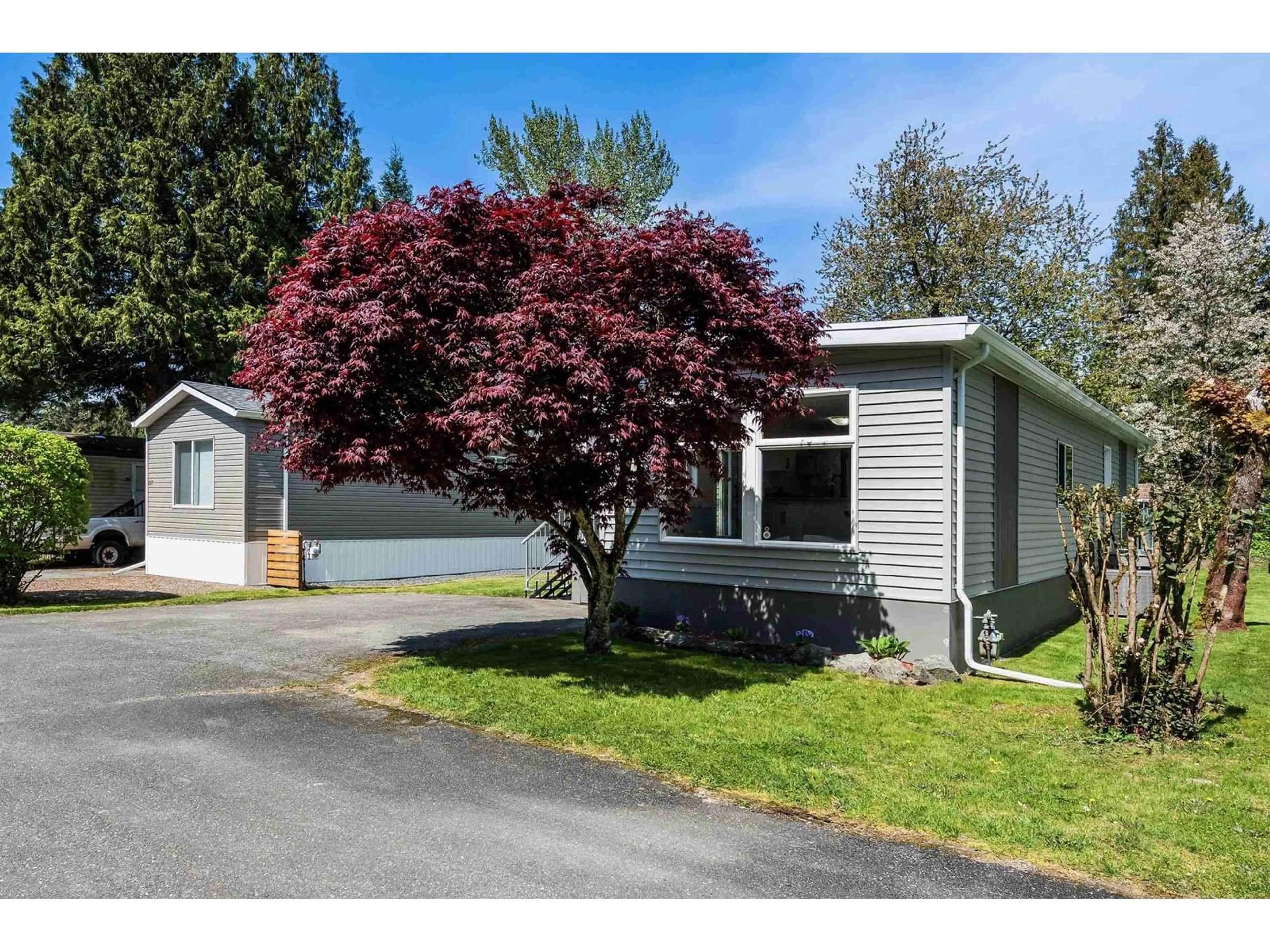 Home with vinyl exterior material, street for 218 - 45835 SLEEPY HOLLOW ROAD, Cultus Lake British Columbia V2R5A9