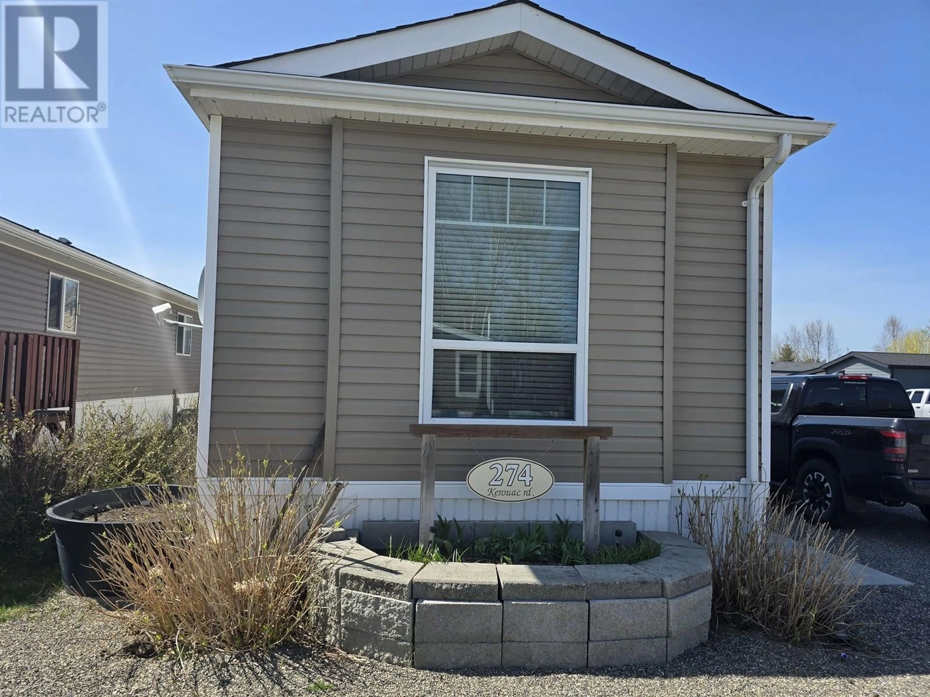 Home with vinyl exterior material, street for 274 KEROUAC ROAD, Quesnel British Columbia V2J7A2