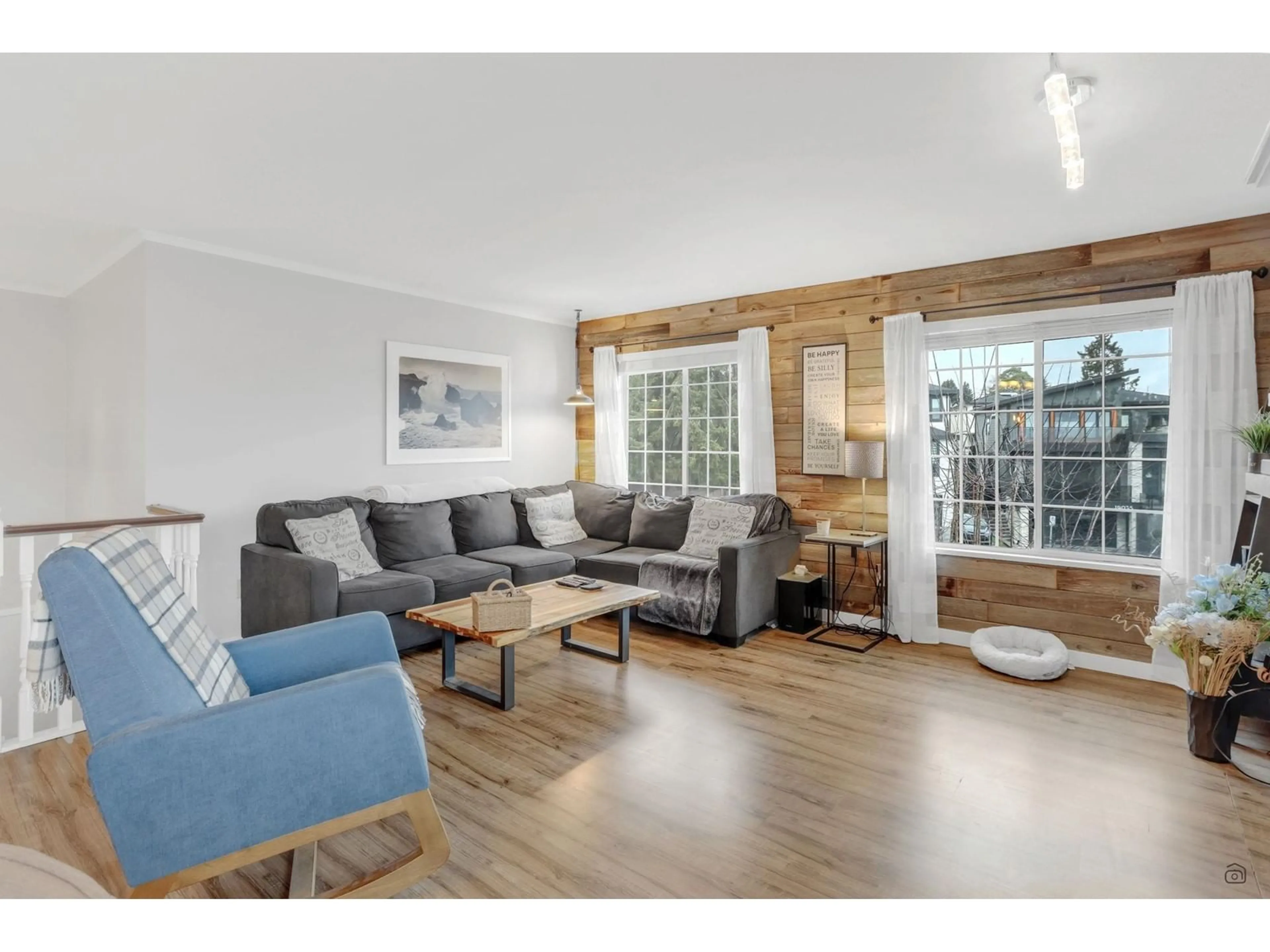 Living room with furniture, wood/laminate floor for 19020 60A, Surrey British Columbia V3S8C9