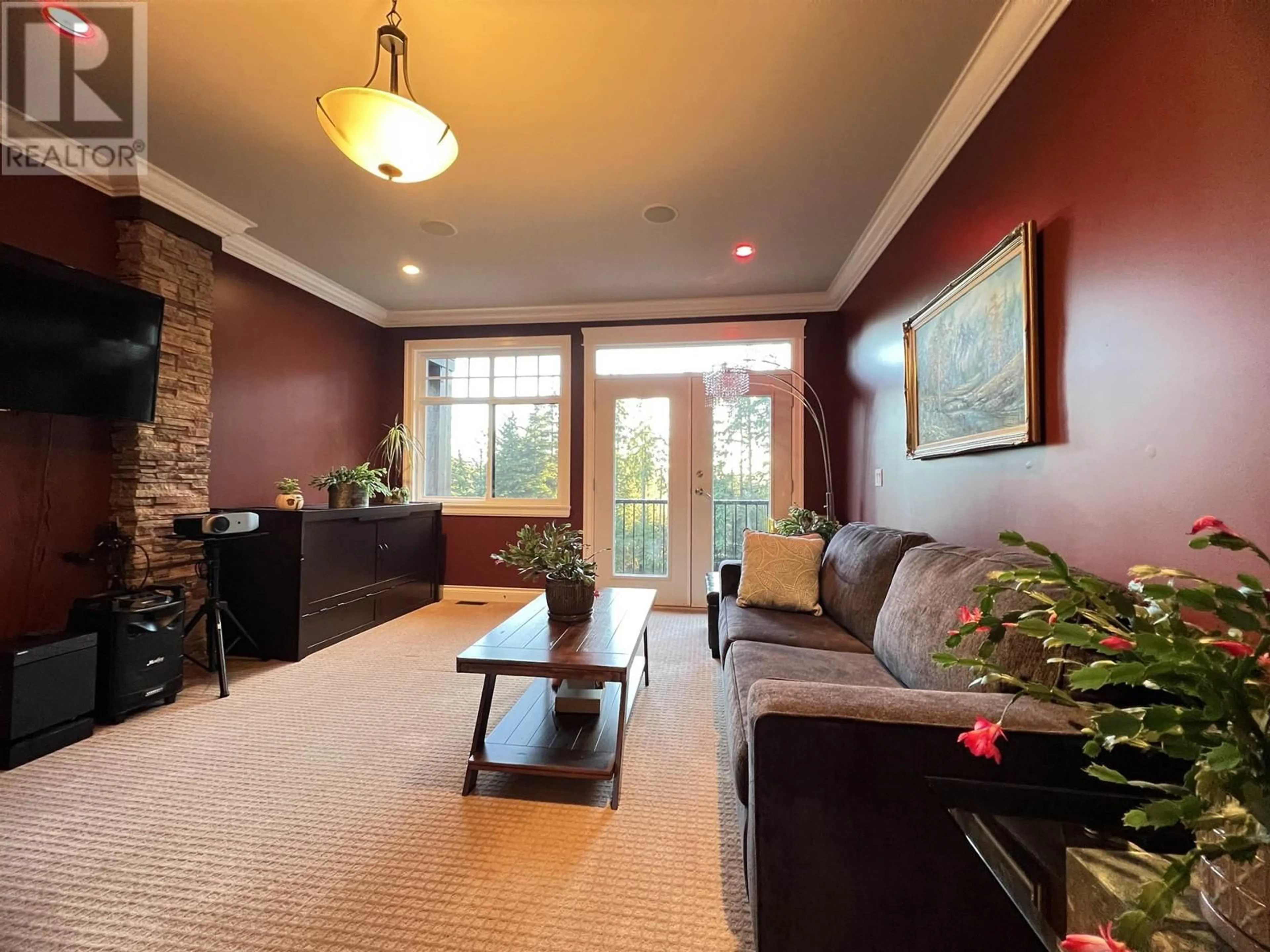 Living room with furniture, wood/laminate floor for 2871 FERN DRIVE, Anmore British Columbia V3H4W9