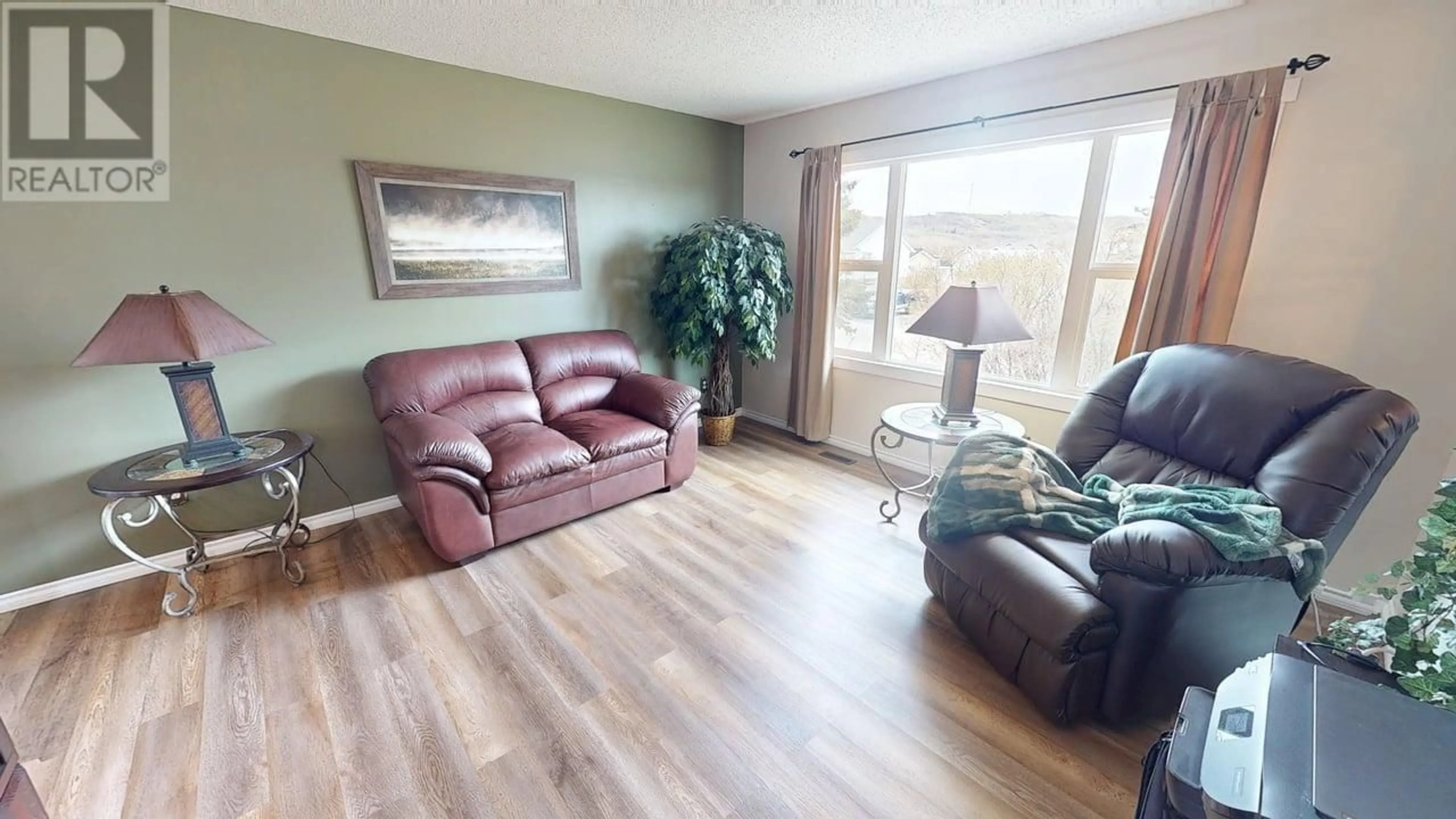 Living room with furniture, wood/laminate floor for 9772 97 STREET, Taylor British Columbia V0C2K0