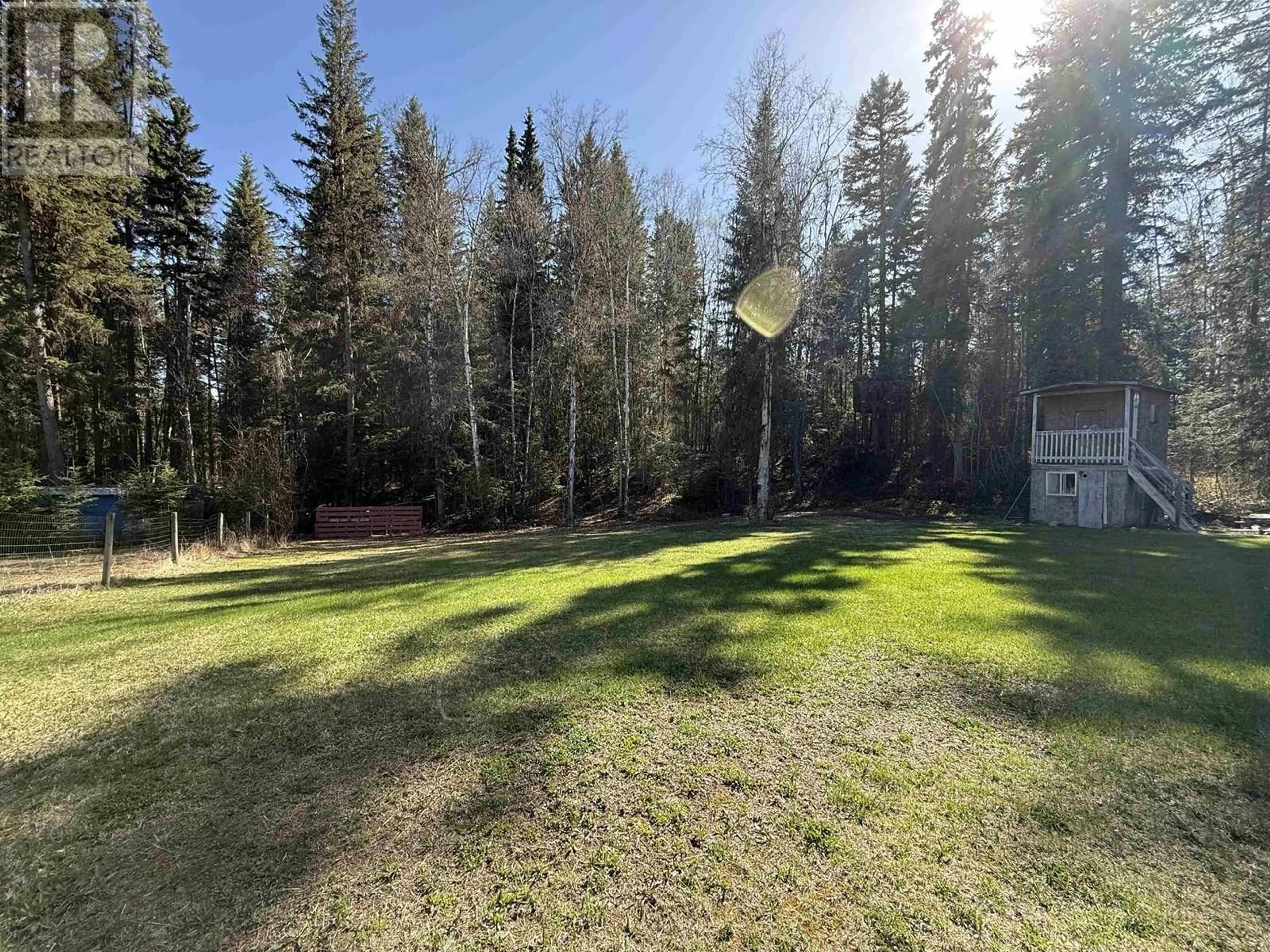 A pic from outside/outdoor area/front of a property/back of a property/a pic from drone, forest/trees view for 2401 TANOKA ROAD, Quesnel British Columbia V2J7B8