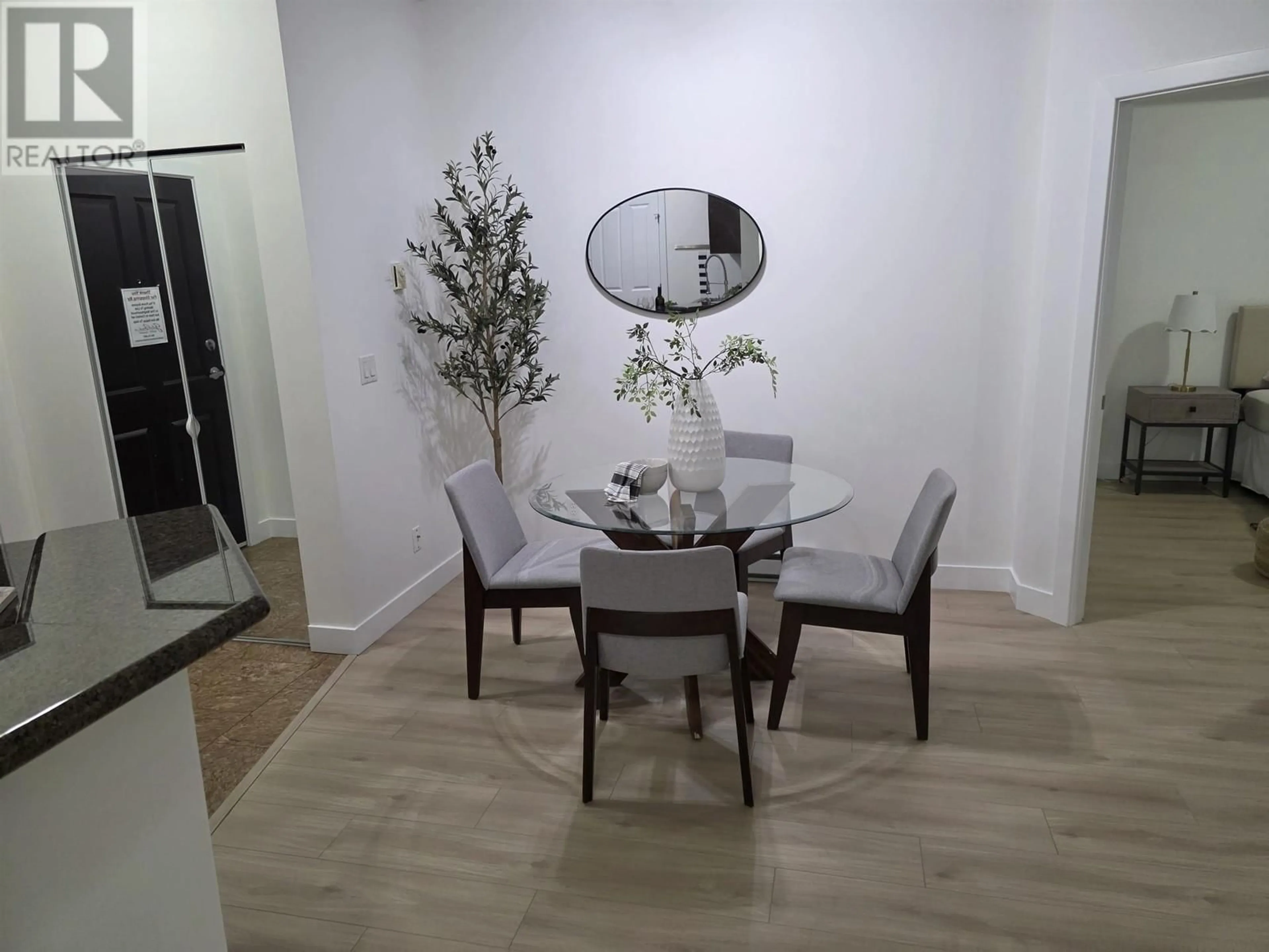 Dining room, wood/laminate floor for 107 - 2330 WILSON AVENUE, Port Coquitlam British Columbia V3C1Z6
