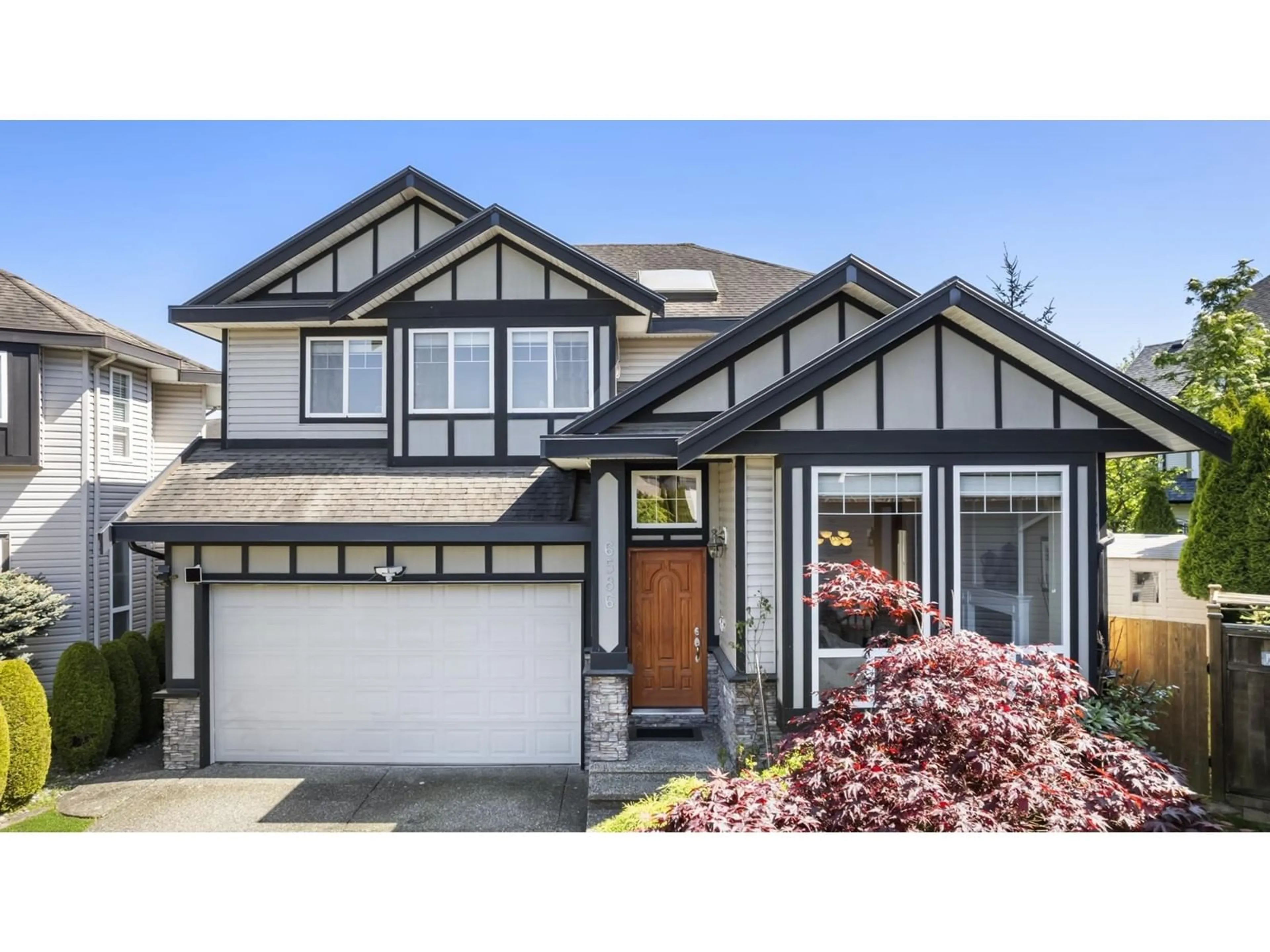 Home with vinyl exterior material, street for 6586 186A, Surrey British Columbia V3S4E5