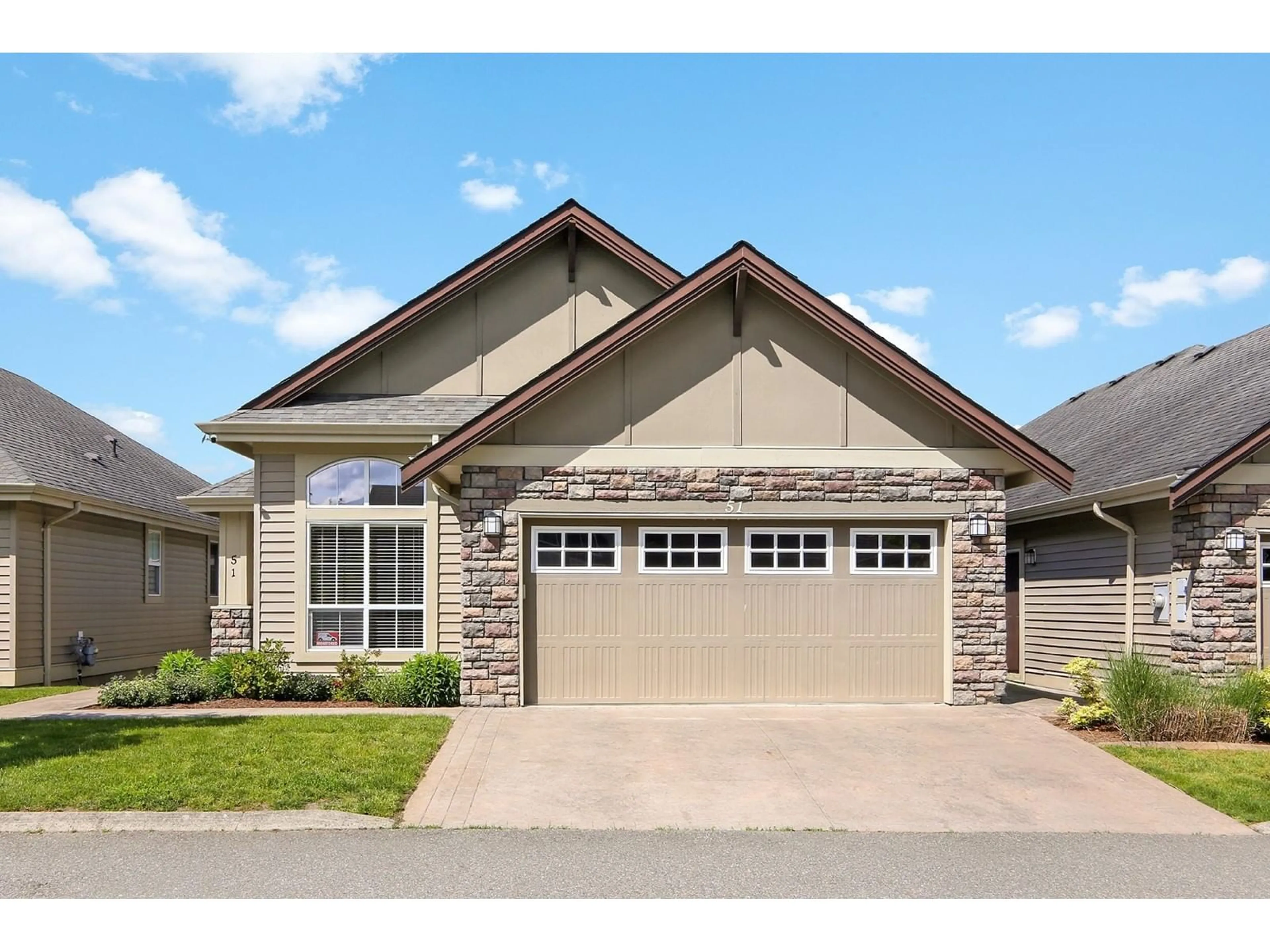 Home with brick exterior material, street for 51 - 6577 SOUTHDOWNE PLACE, Chilliwack British Columbia V2R0H4