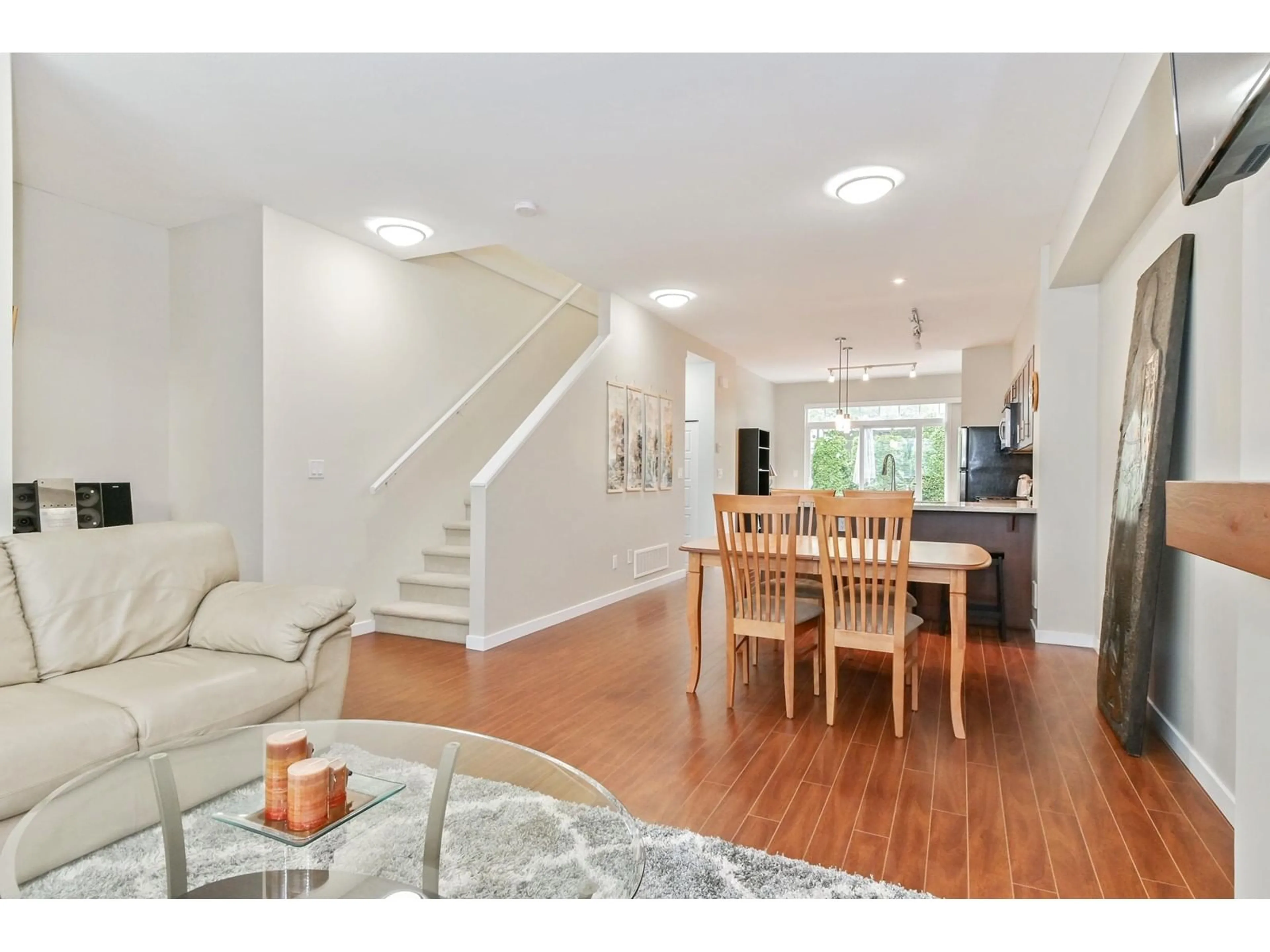 Open concept kitchen, wood/laminate floor for 45 - 14356 63A, Surrey British Columbia V3X0E3