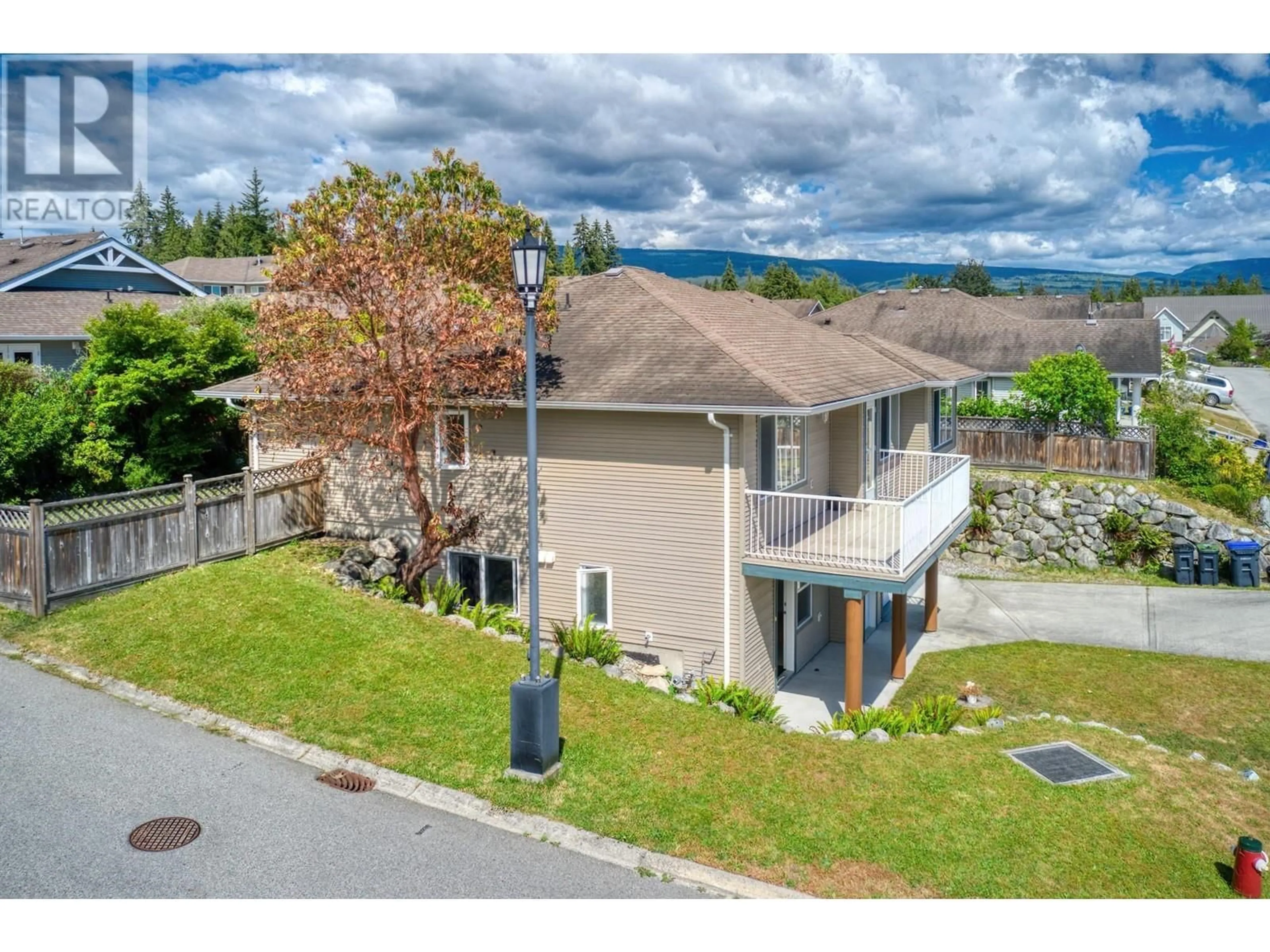 A pic from outside/outdoor area/front of a property/back of a property/a pic from drone, mountain view for 5683 EMILY WAY, Sechelt British Columbia V7Z0N5