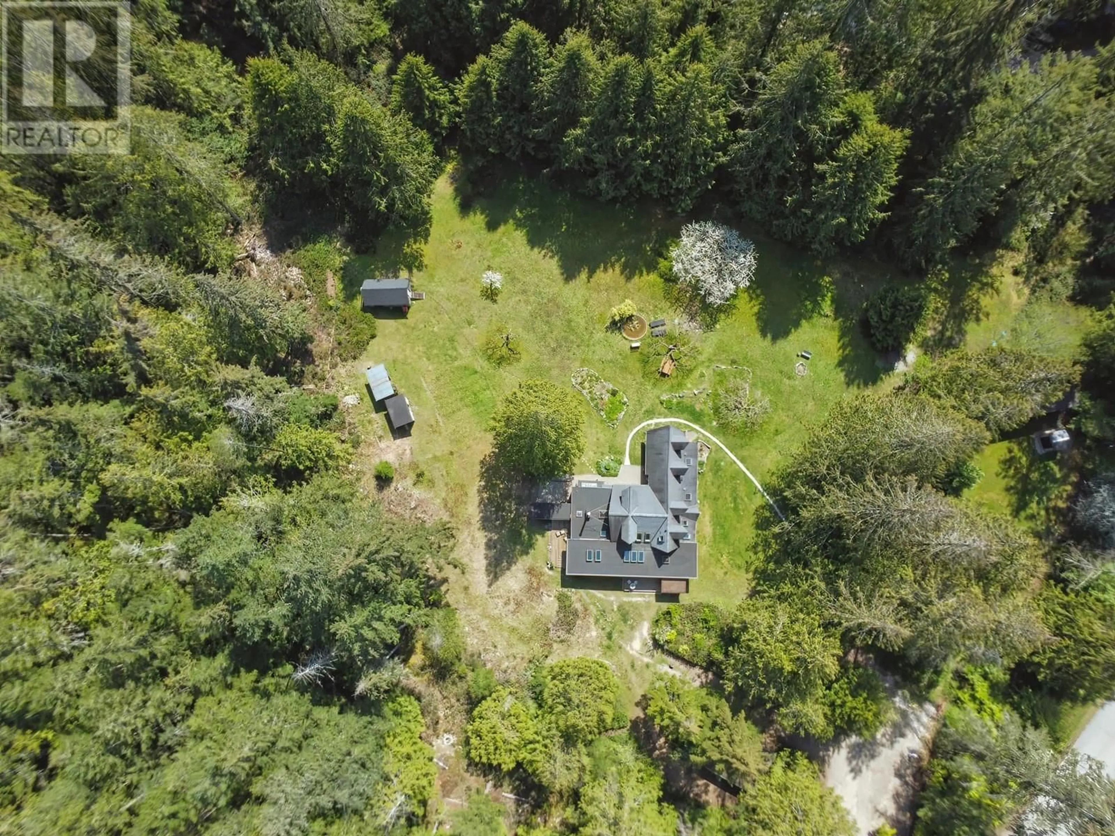 A pic from outside/outdoor area/front of a property/back of a property/a pic from drone, forest/trees view for 1546 LOCKYER ROAD, Roberts Creek British Columbia V0N2W1