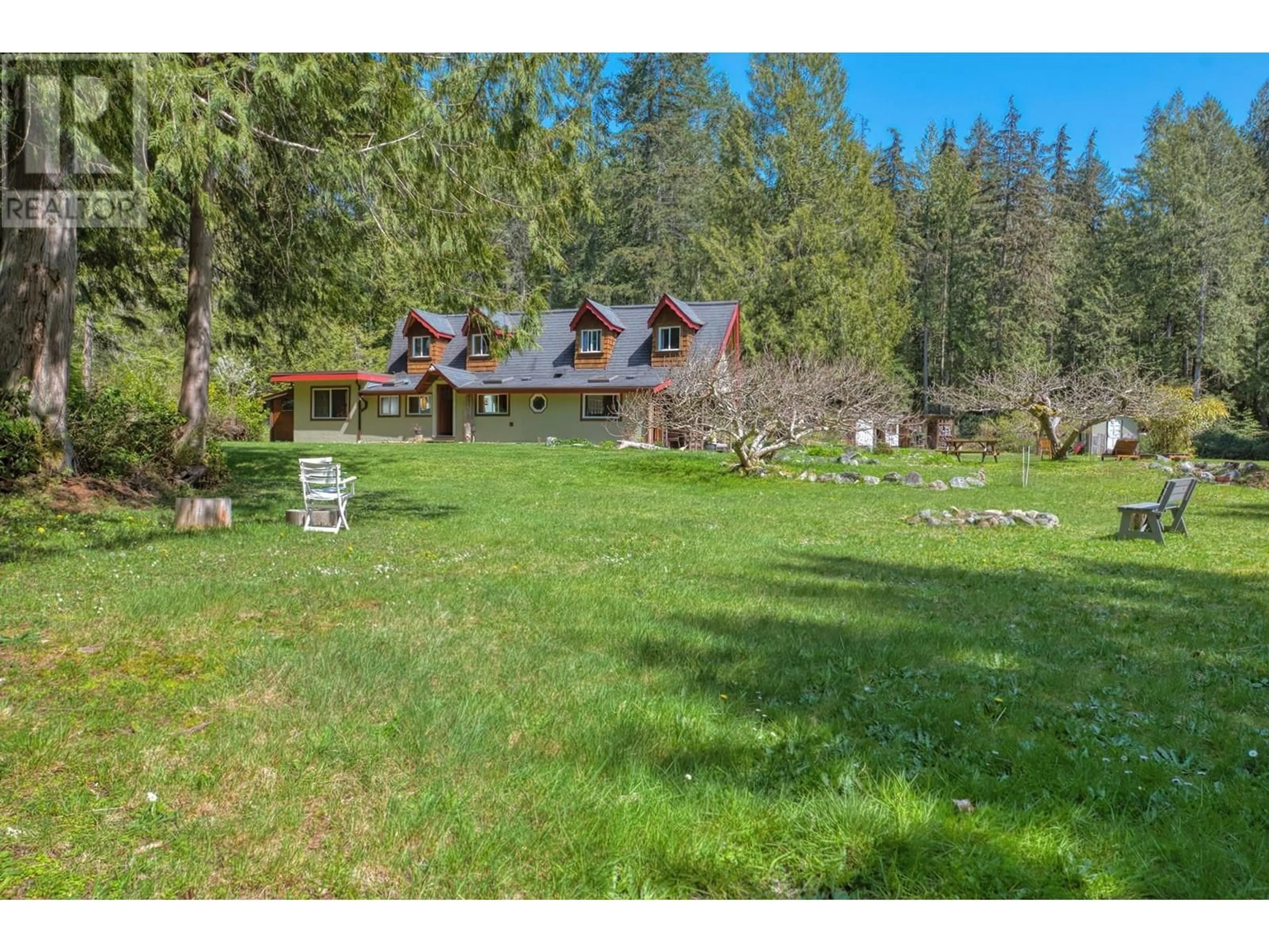 A pic from outside/outdoor area/front of a property/back of a property/a pic from drone, mountain view for 1546 LOCKYER ROAD, Roberts Creek British Columbia V0N2W1
