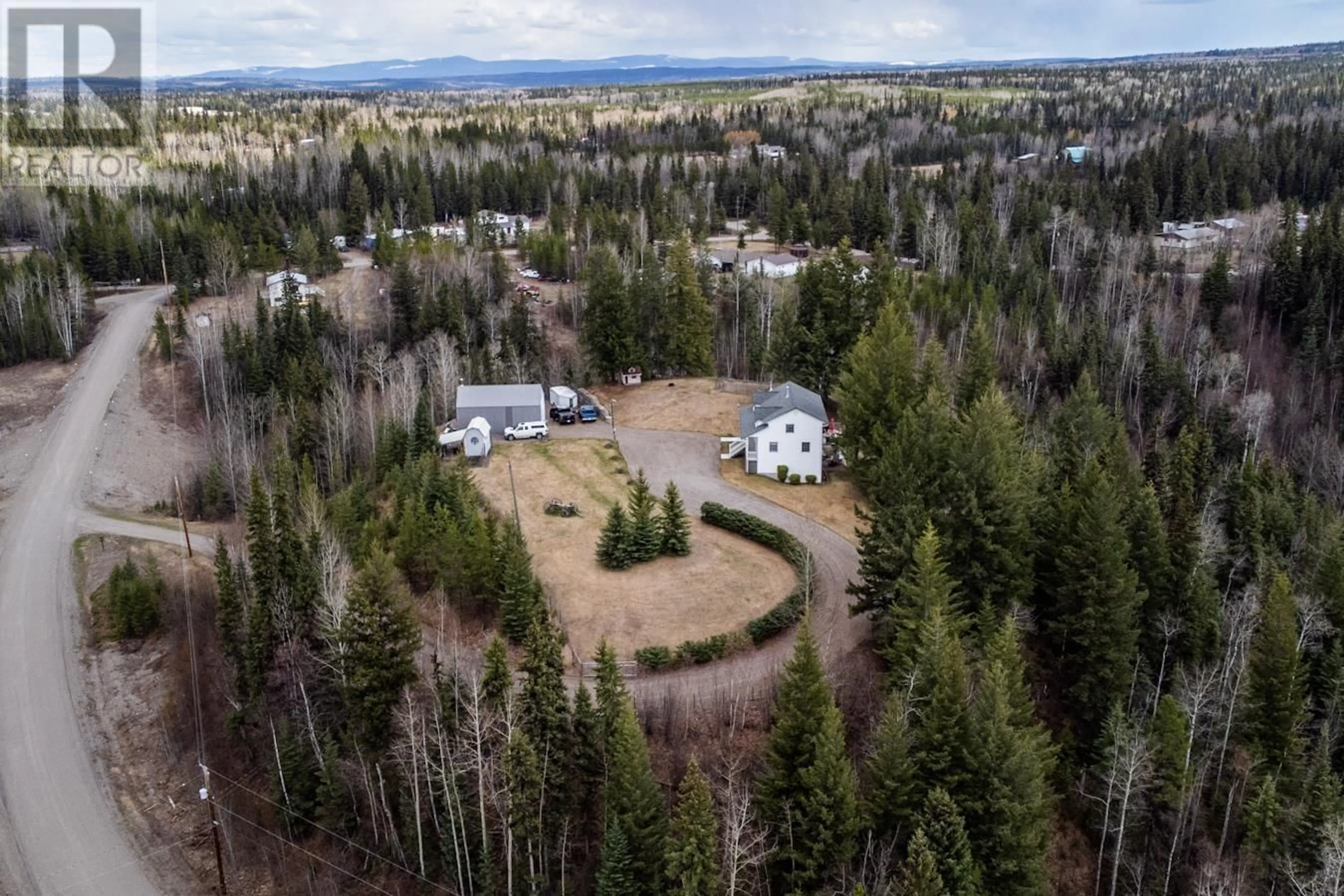 A pic from outside/outdoor area/front of a property/back of a property/a pic from drone, forest/trees view for 14195 WESTBE ROAD, Prince George British Columbia V2N5C2