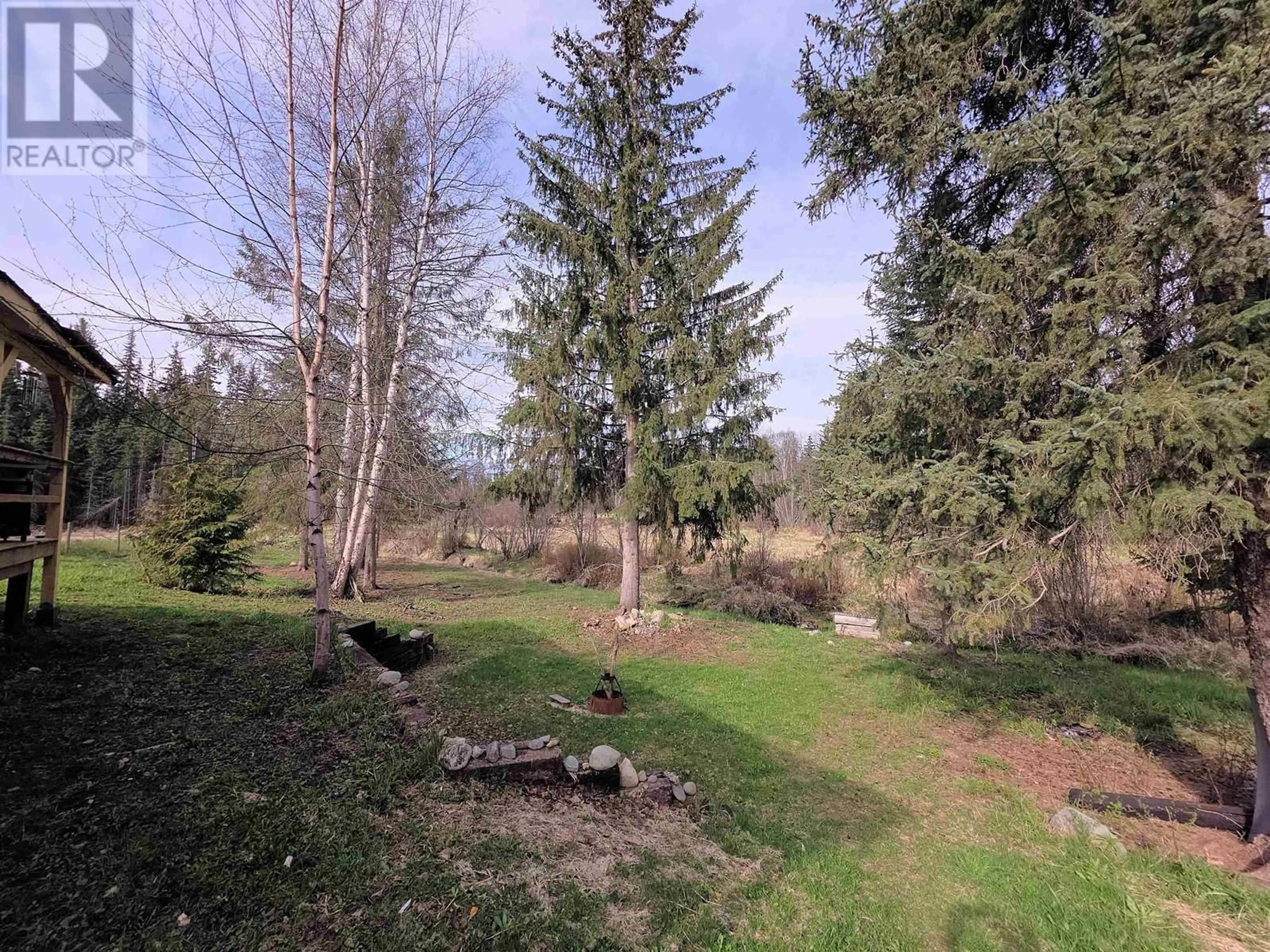 A pic from outside/outdoor area/front of a property/back of a property/a pic from drone, forest/trees view for 14 COMEAU ROAD, Hazelton British Columbia V0J2J1