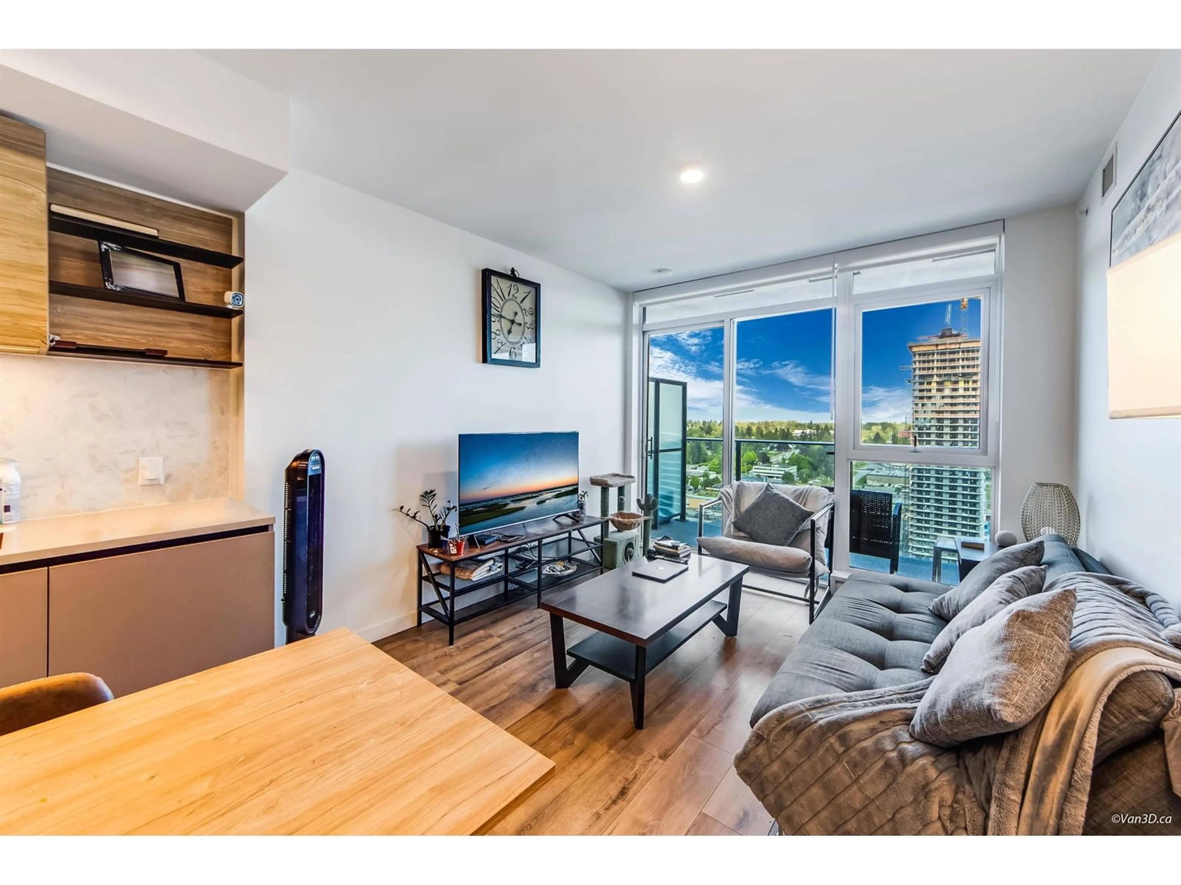 Living room with furniture, wood/laminate floor for 2306 - 13428 105, Surrey British Columbia V6Y1G8