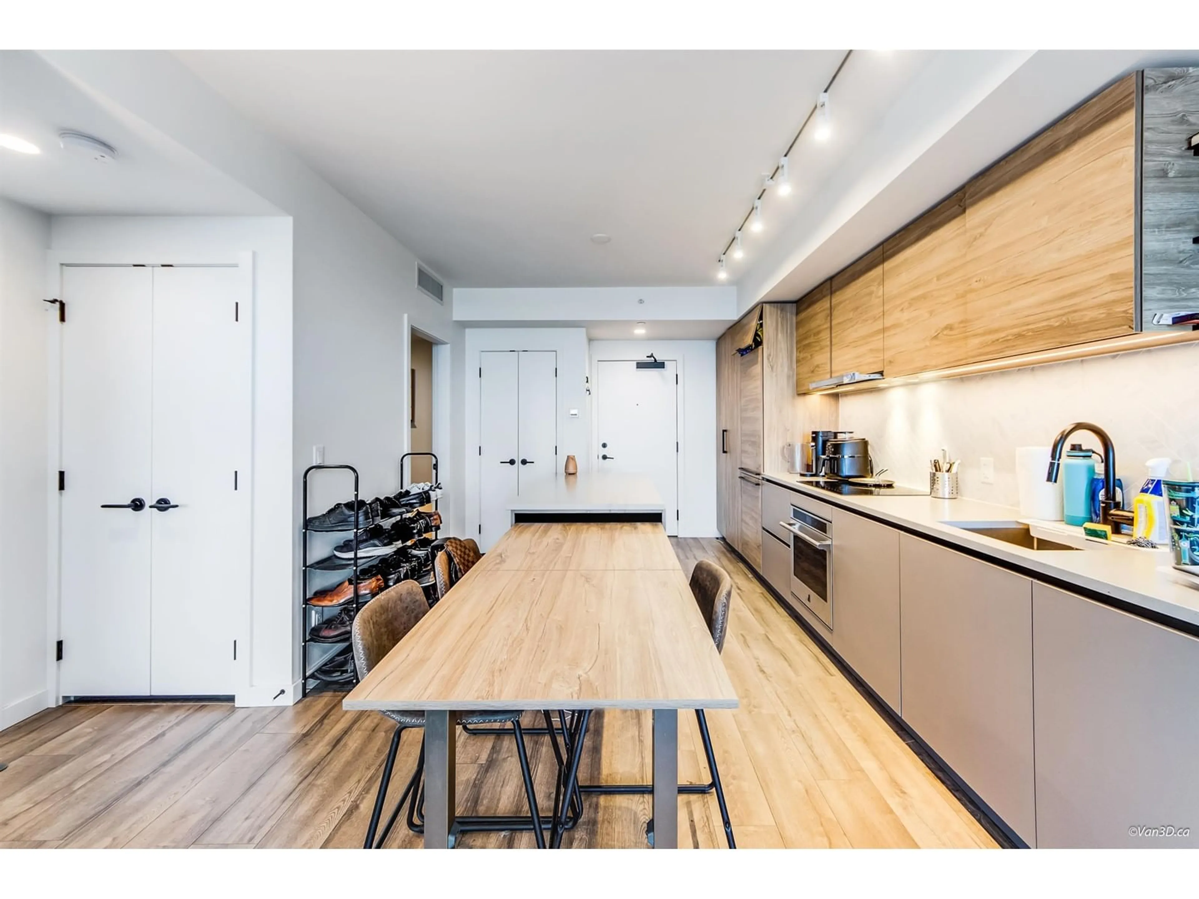 Open concept kitchen, wood/laminate floor for 2306 - 13428 105, Surrey British Columbia V6Y1G8