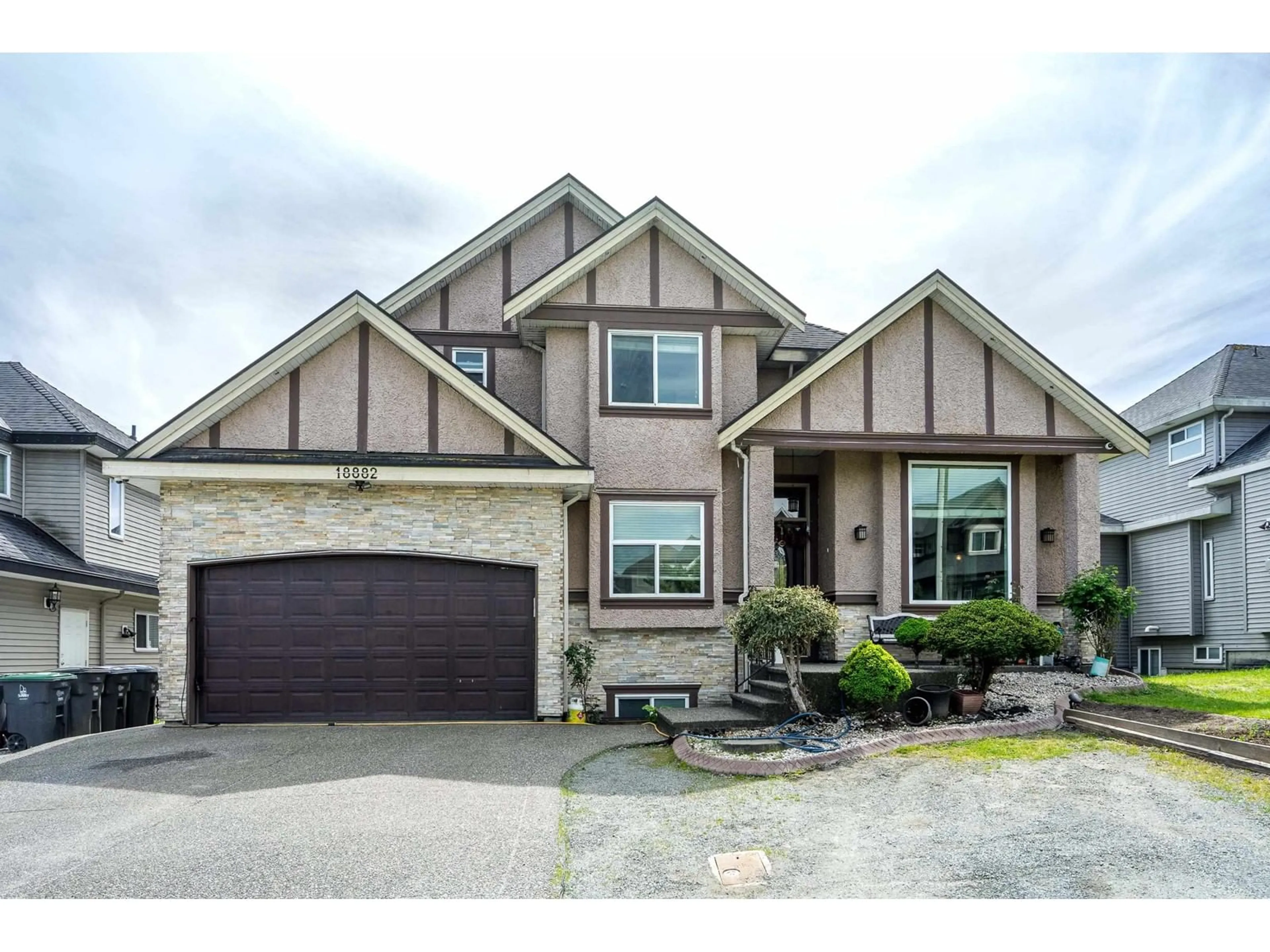 Home with brick exterior material, street for 18882 54, Surrey British Columbia V3S2K2