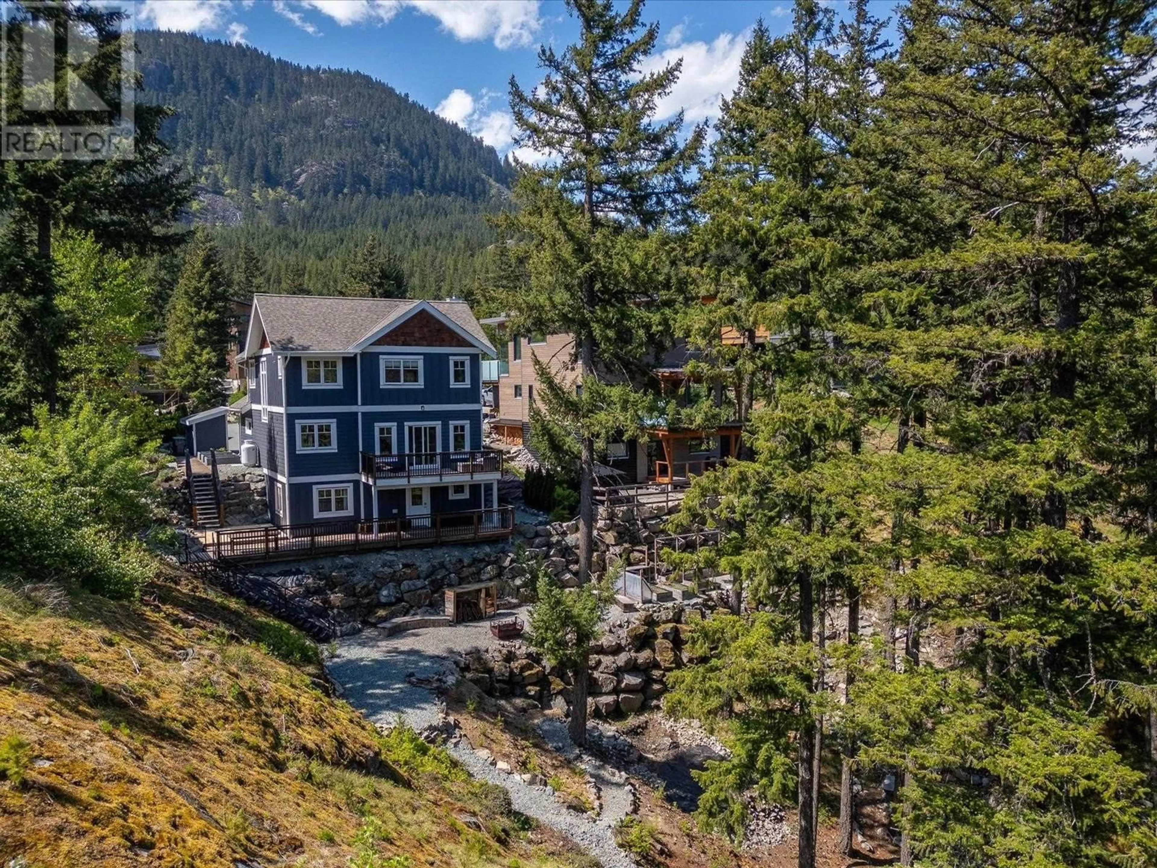 A pic from outside/outdoor area/front of a property/back of a property/a pic from drone, mountain view for 7458 DOGWOOD STREET, Pemberton British Columbia V0N2L0