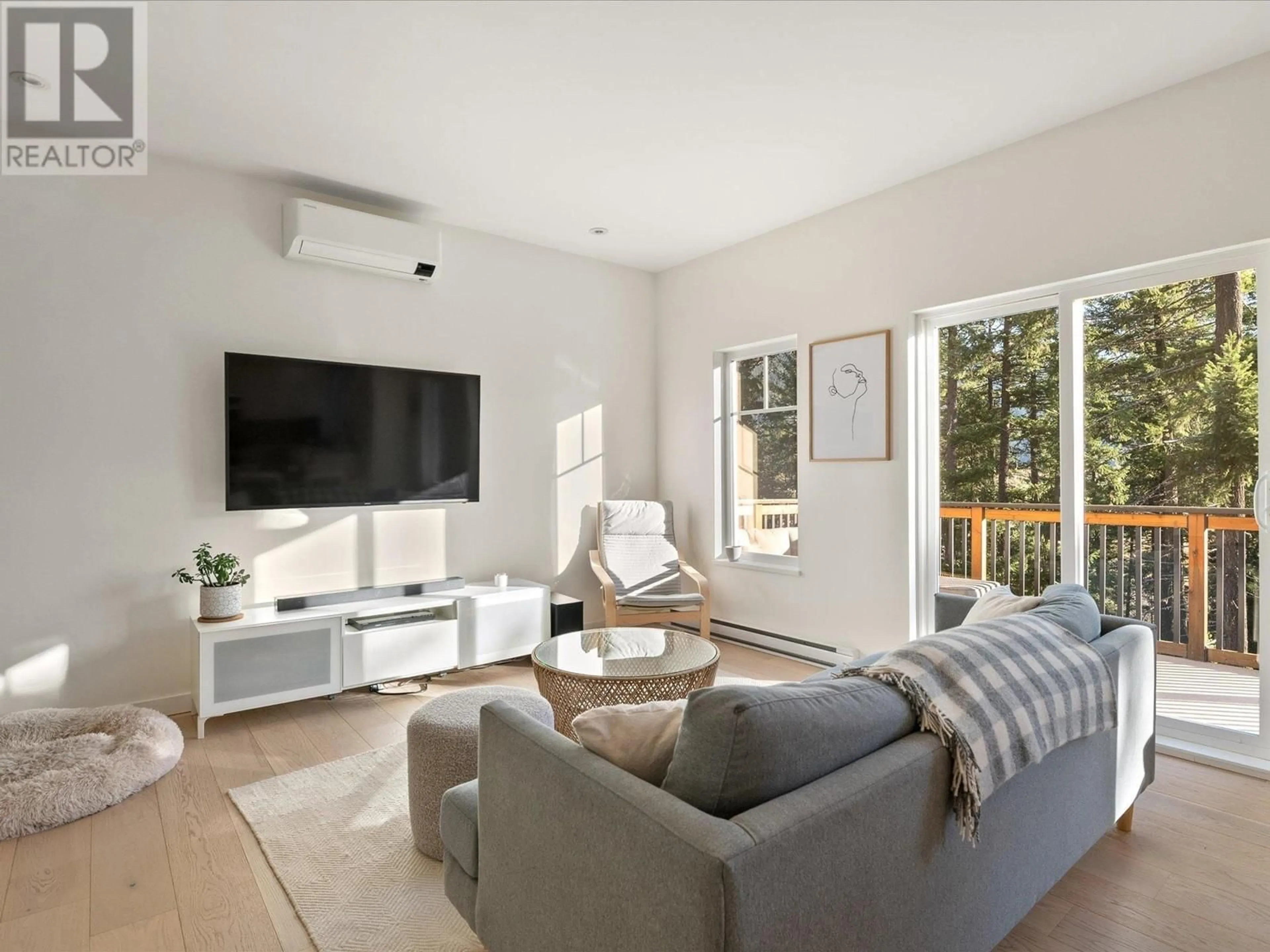 Living room with furniture, unknown for 7458 DOGWOOD STREET, Pemberton British Columbia V0N2L0