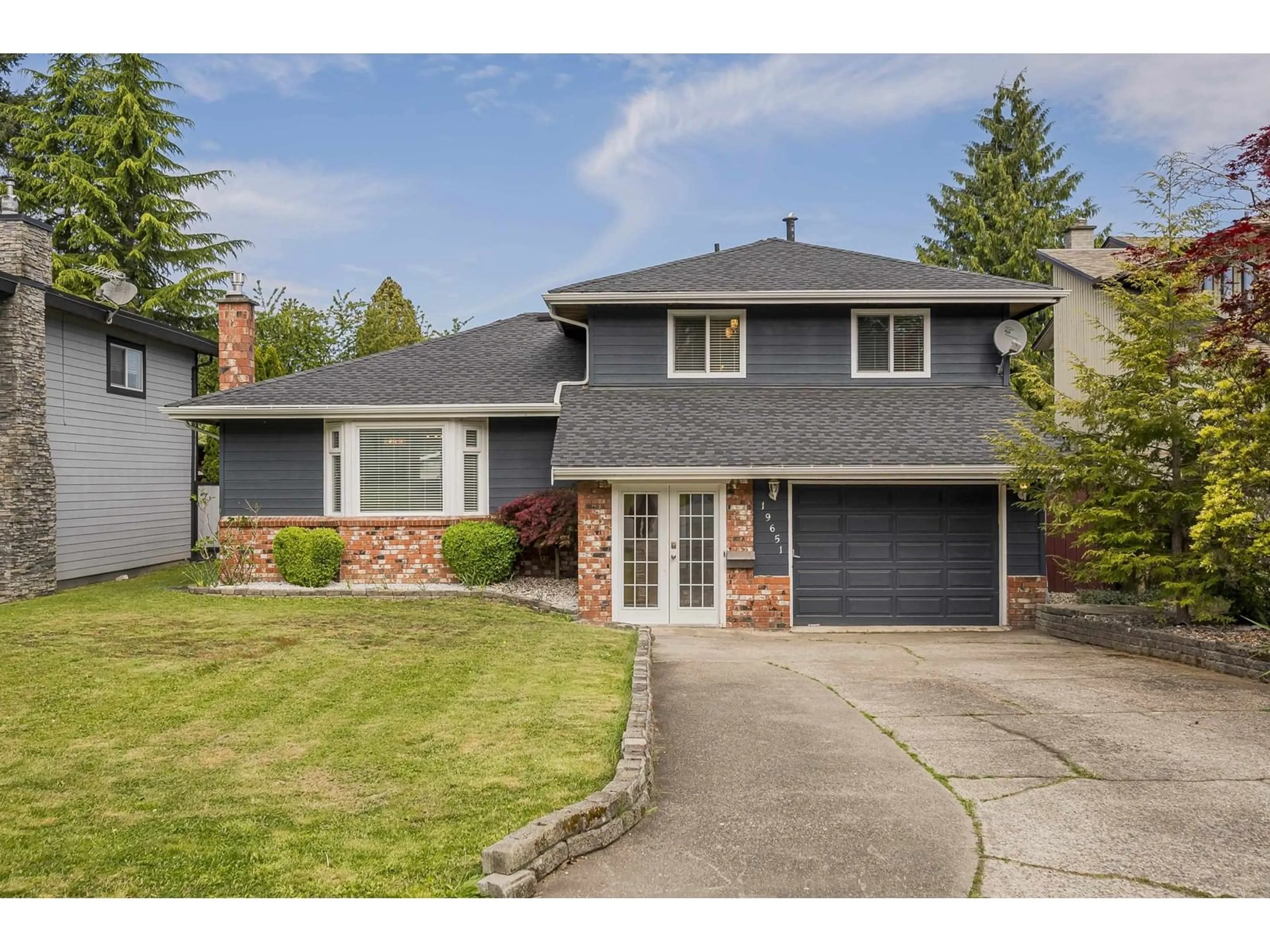 Home with brick exterior material, street for 19651 50A, Langley British Columbia V3A7K9