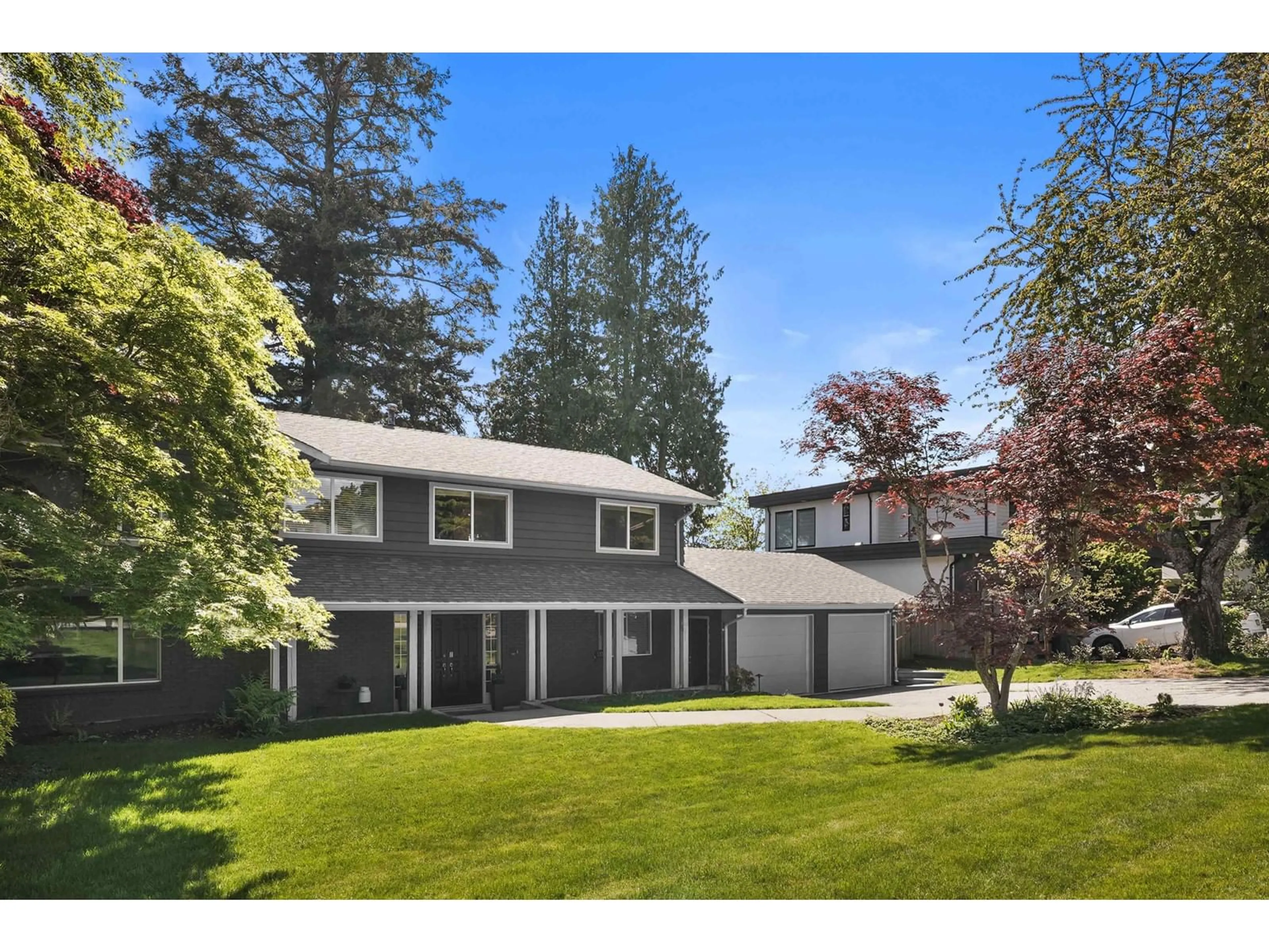 A pic from outside/outdoor area/front of a property/back of a property/a pic from drone, unknown for 13146 14, Surrey British Columbia V4A1G5