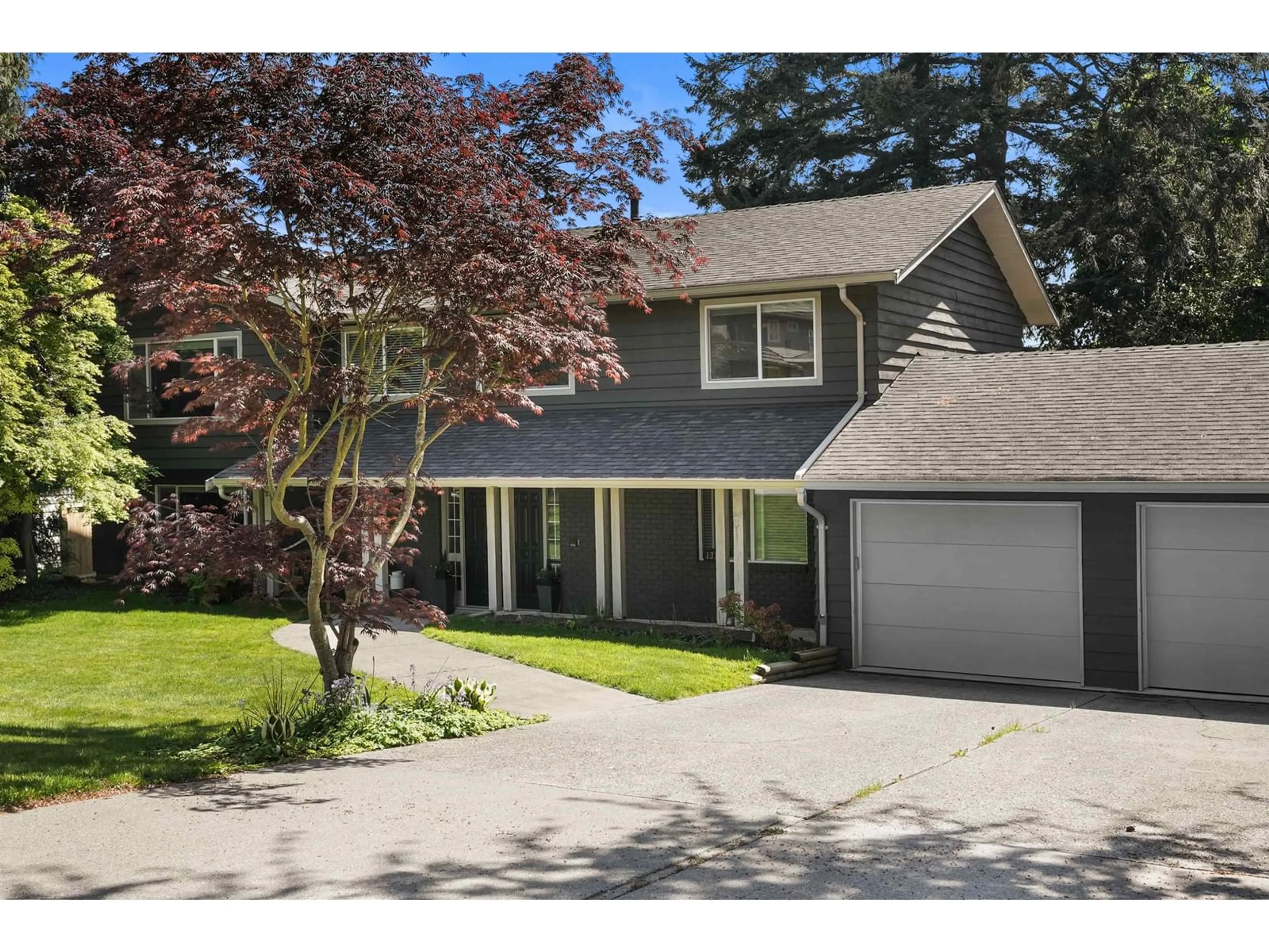 Home with vinyl exterior material, street for 13146 14, Surrey British Columbia V4A1G5