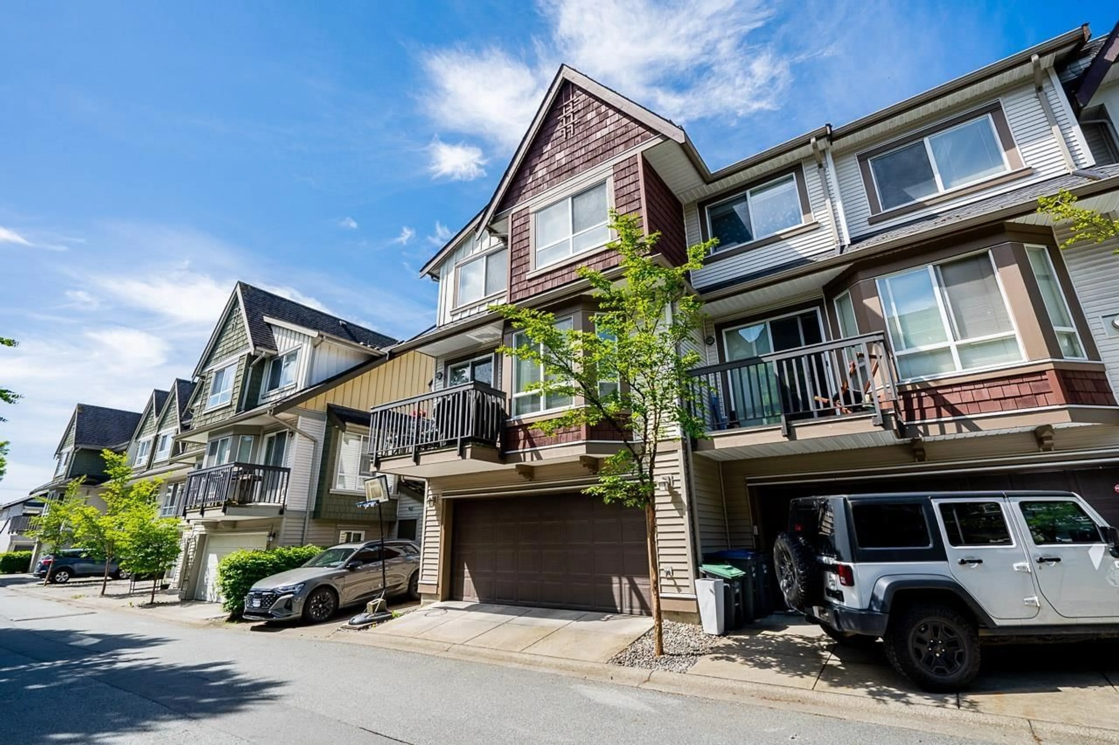 A pic from outside/outdoor area/front of a property/back of a property/a pic from drone, street for 67 - 7155 189, Surrey British Columbia V4N5S8