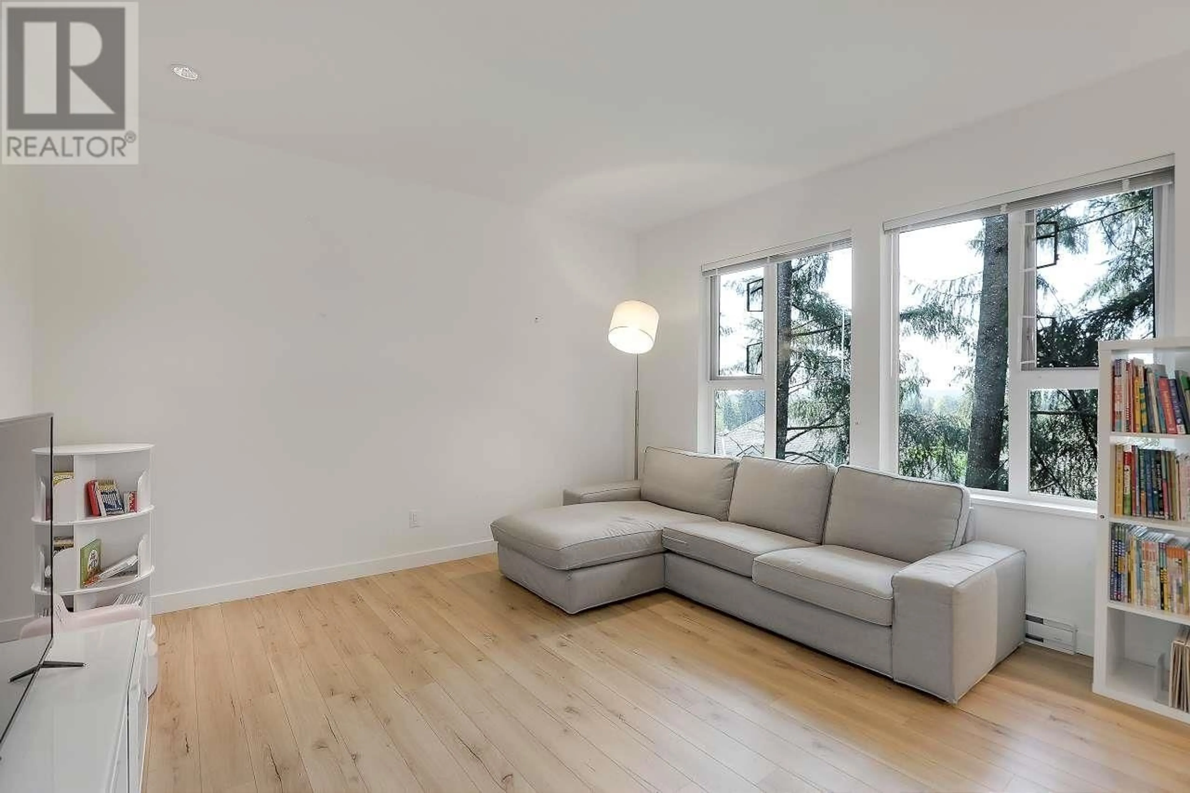 Living room with furniture, wood/laminate floor for 76 - 1228 HUDSON STREET, Coquitlam British Columbia V3B0R3
