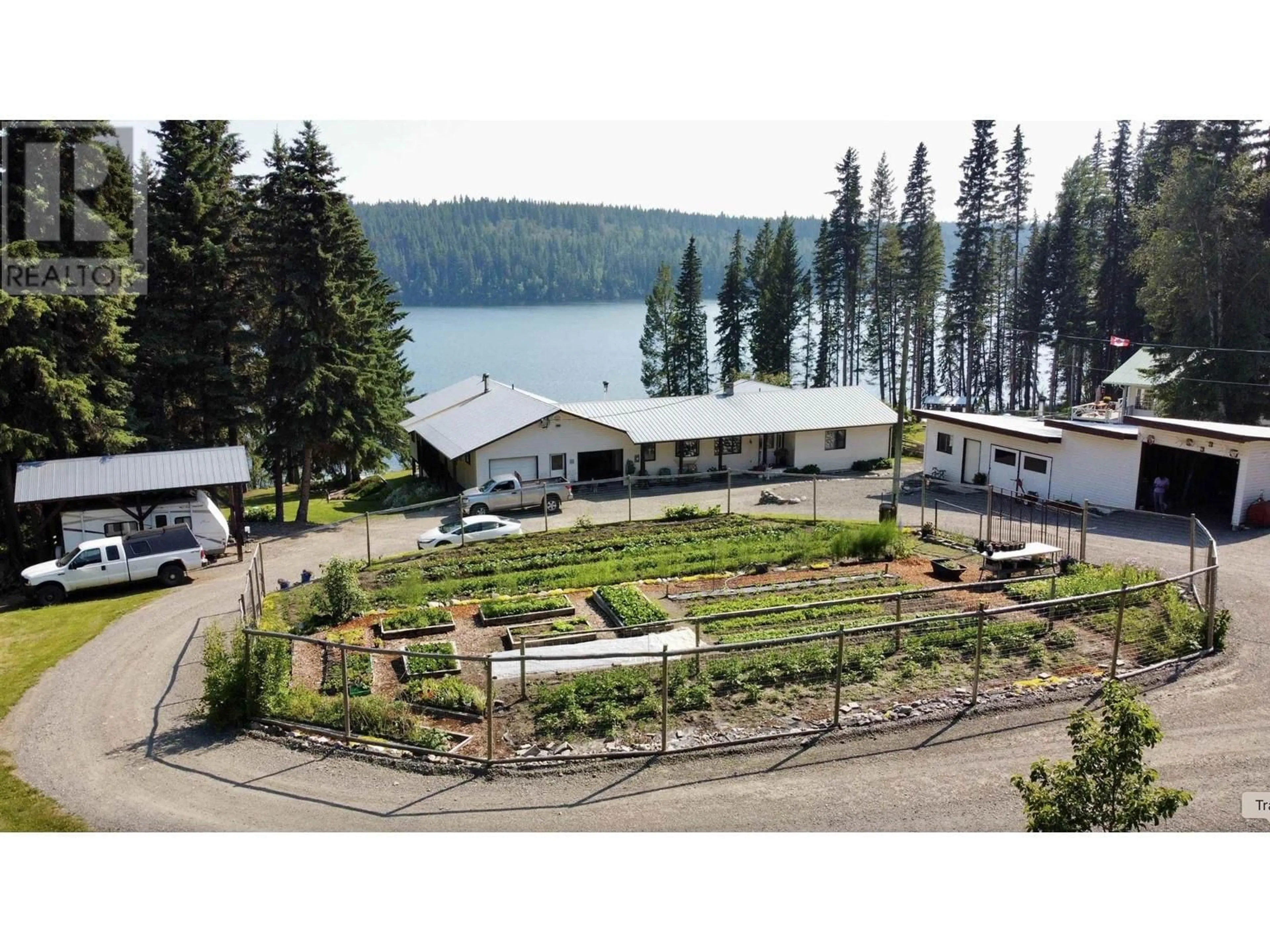 A pic from outside/outdoor area/front of a property/back of a property/a pic from drone, water/lake/river/ocean view for 5790 TIMOTHY LAKE ROAD, Lac La Hache British Columbia V0K1T0