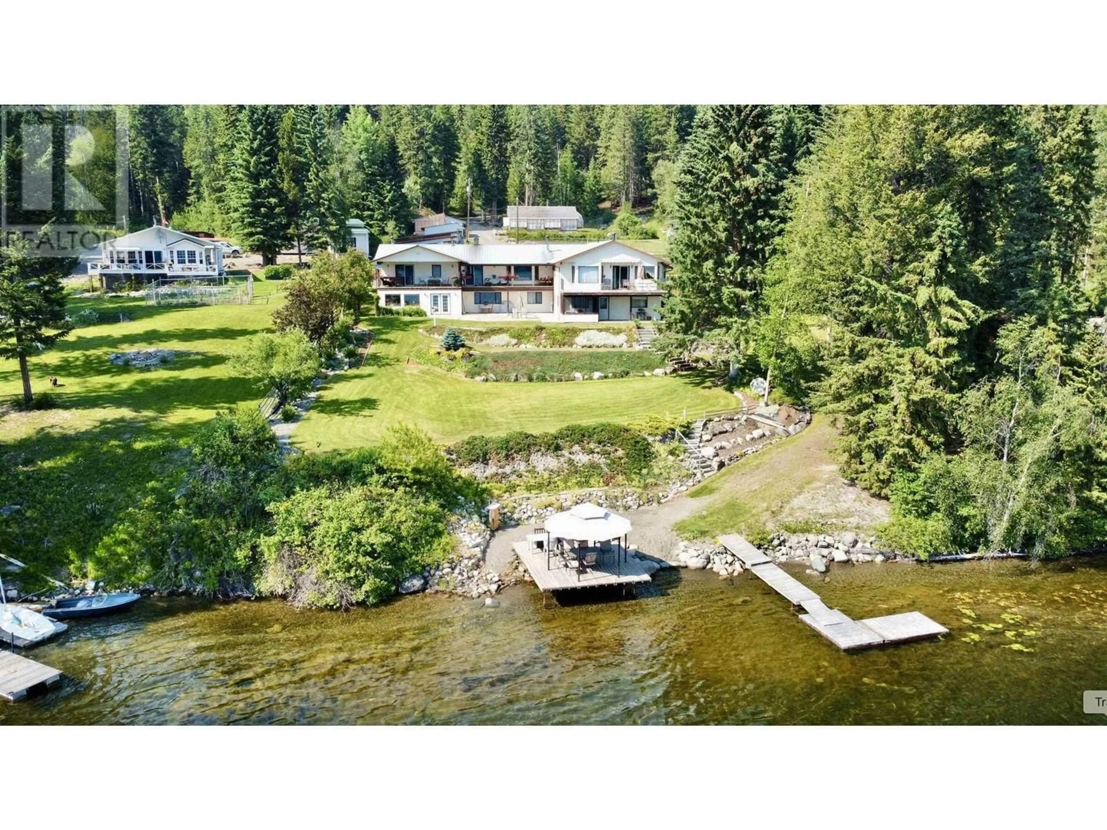 A pic from outside/outdoor area/front of a property/back of a property/a pic from drone, water/lake/river/ocean view for 5790 TIMOTHY LAKE ROAD, Lac La Hache British Columbia V0K1T0