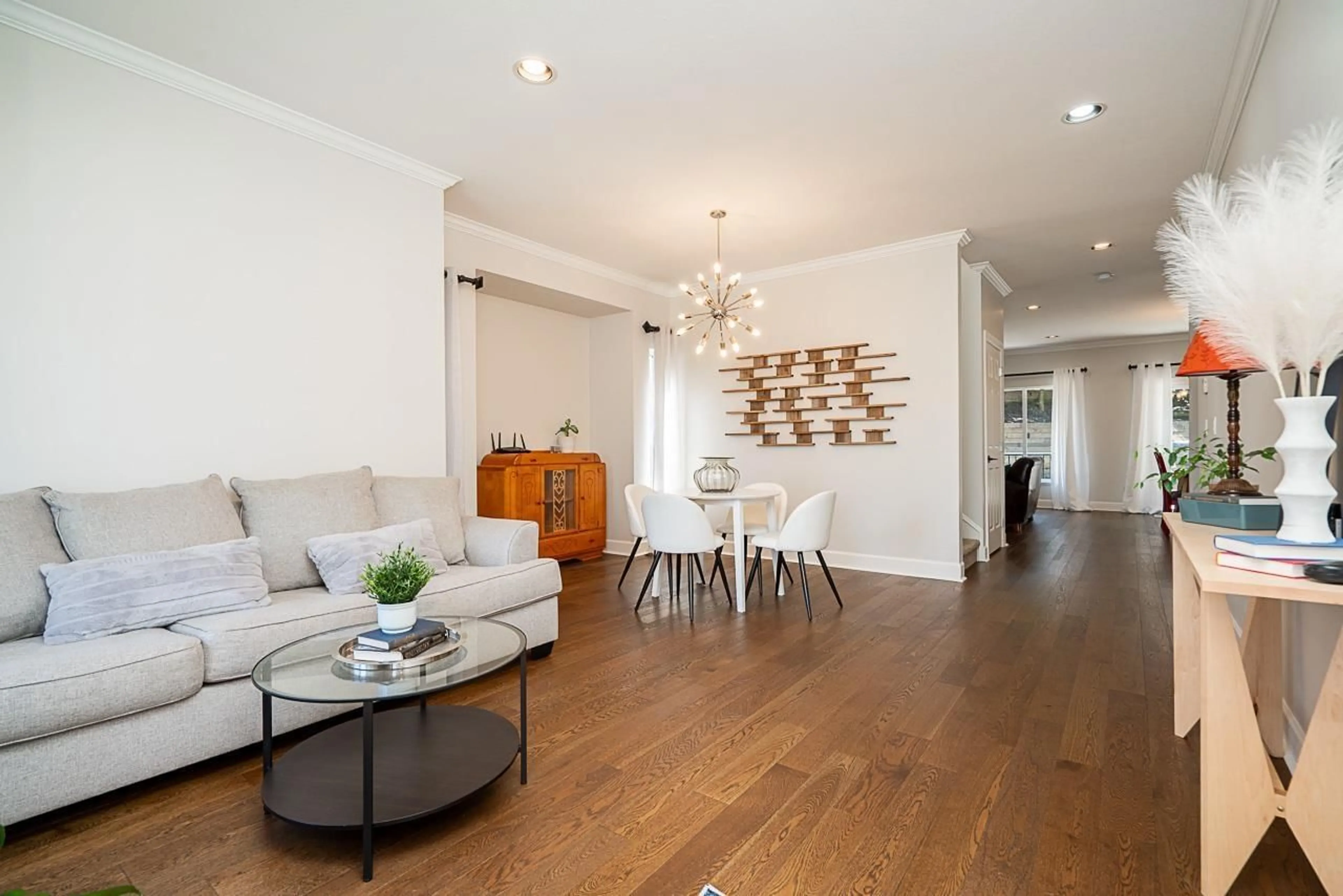 Living room with furniture, wood/laminate floor for 5939 165A, Surrey British Columbia V3S4N9