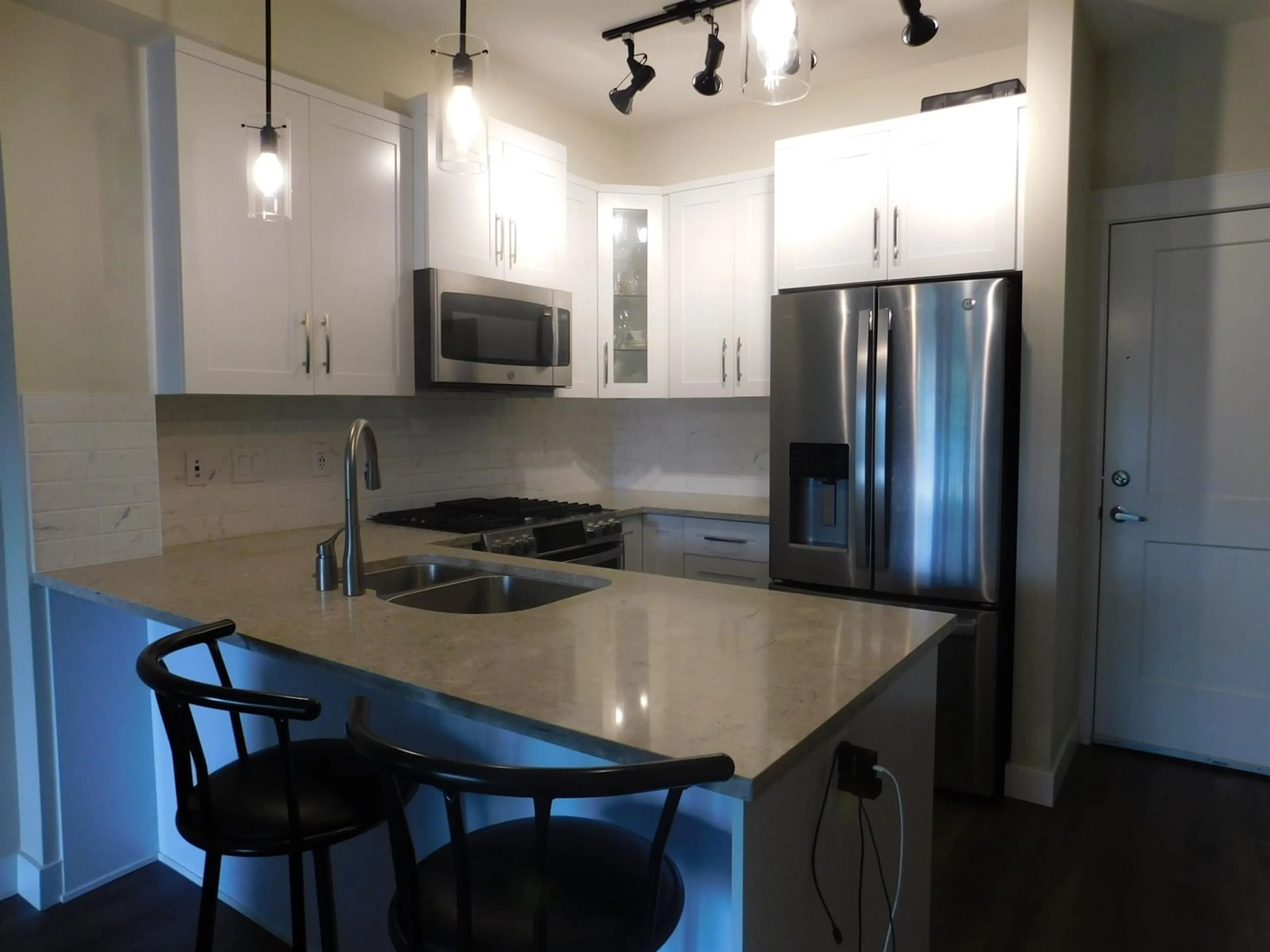 Open concept kitchen, unknown for 427 - 11077 RAVINE, Surrey British Columbia V3T0R7