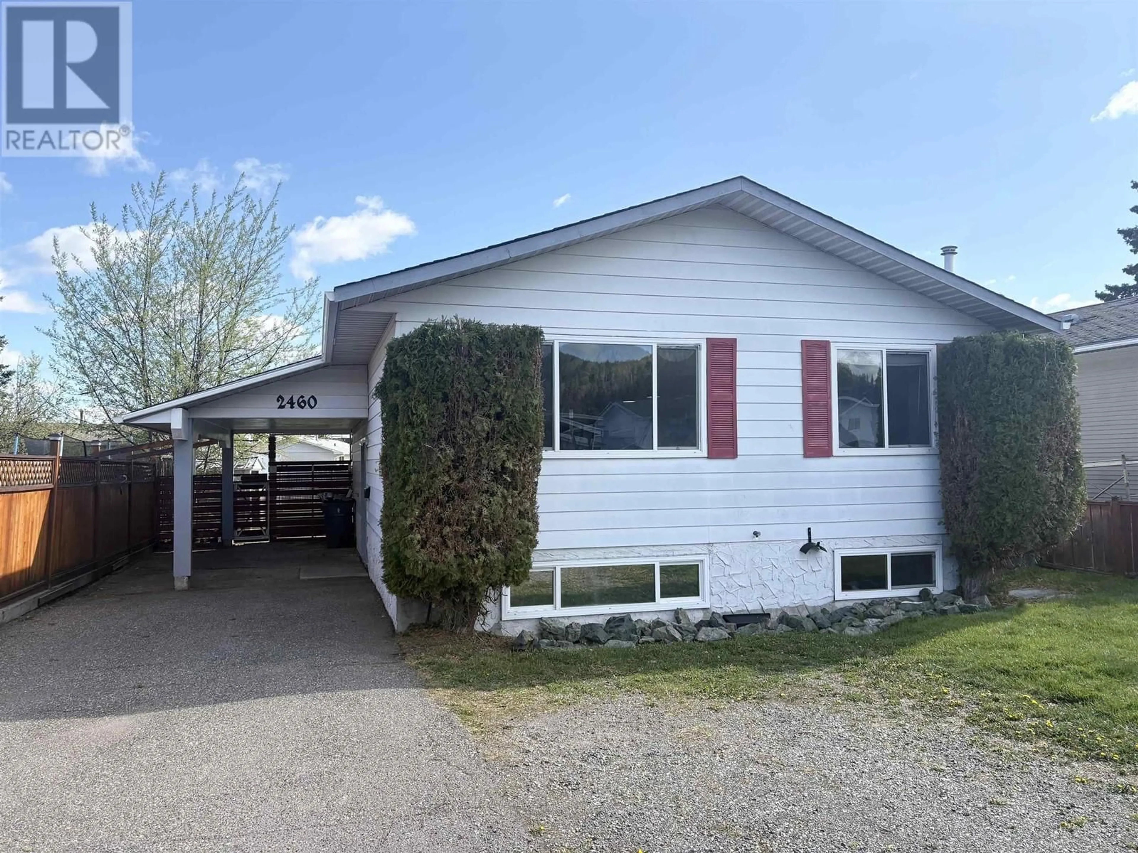 Home with vinyl exterior material, street for 2460 FOOT STREET, Prince George British Columbia V2N2Y4