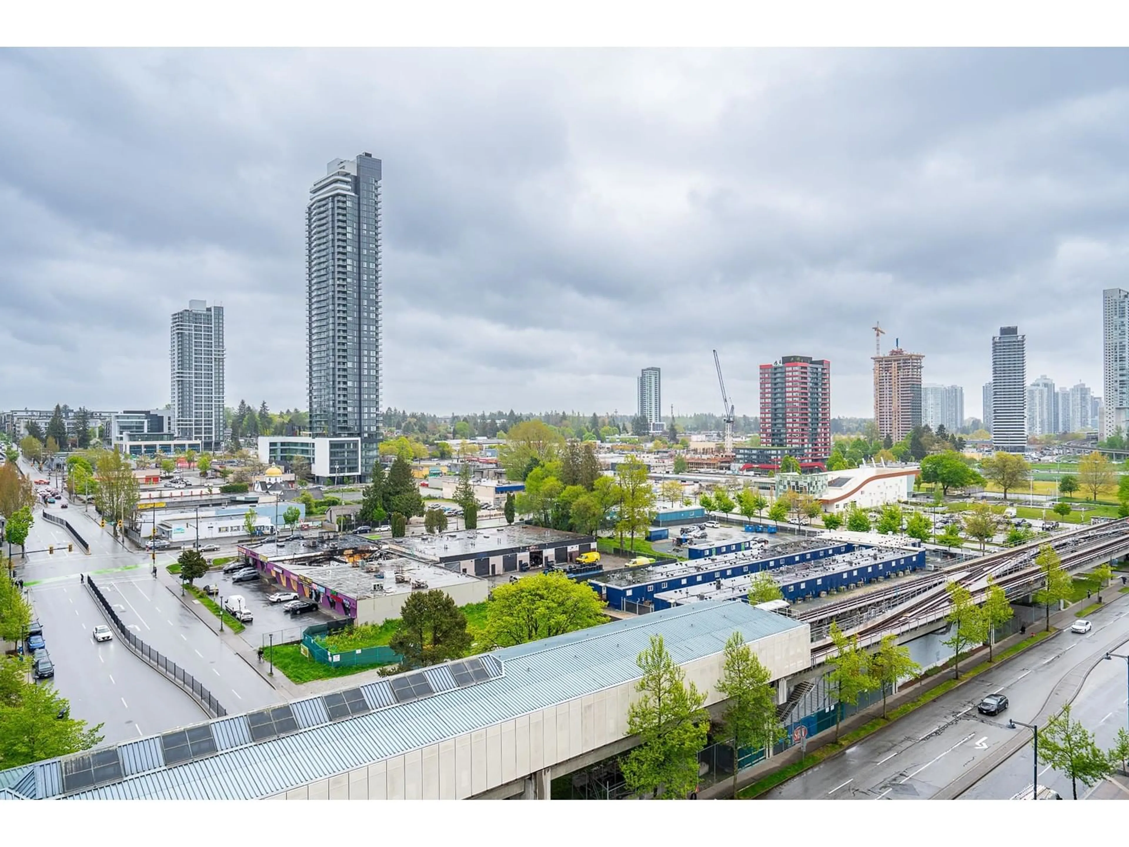 A pic from outside/outdoor area/front of a property/back of a property/a pic from drone, city buildings view from balcony for 1301 - 13383 108, Surrey British Columbia V3T5T6
