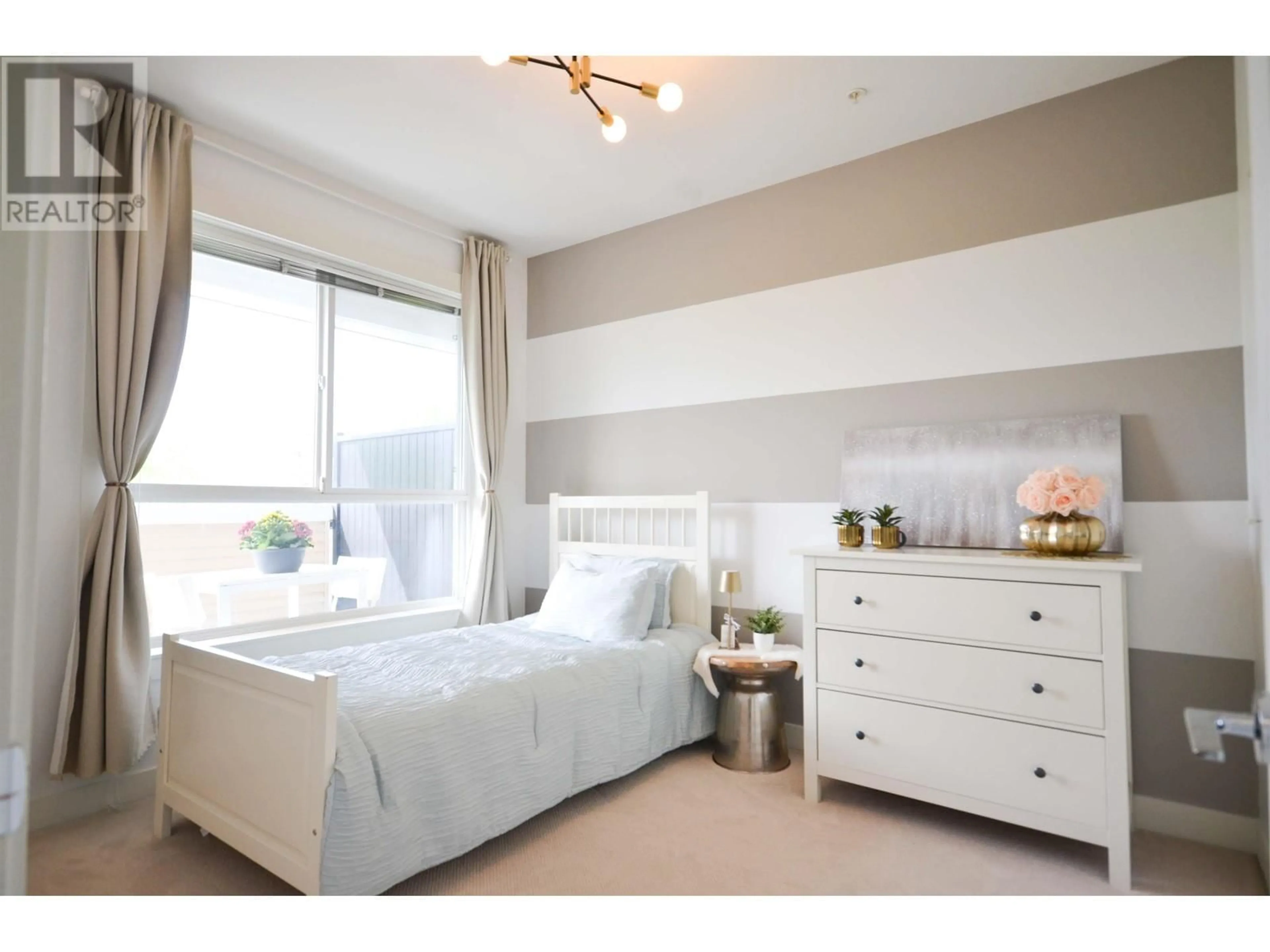 Bedroom with bed, wood/laminate floor for 204 - 827 RODERICK AVENUE, Coquitlam British Columbia V3K0E3